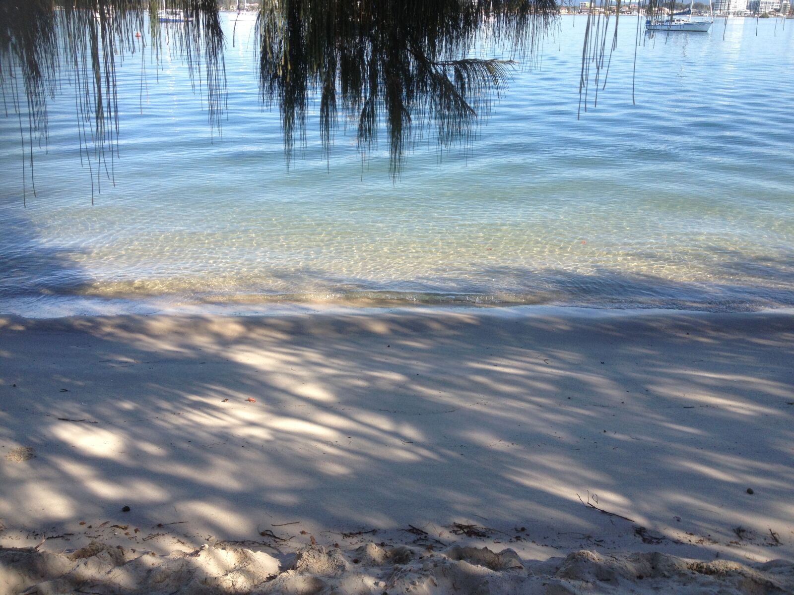 iPhone 4S back camera 4.28mm f/2.4 sample photo. Beach, shade, water photography
