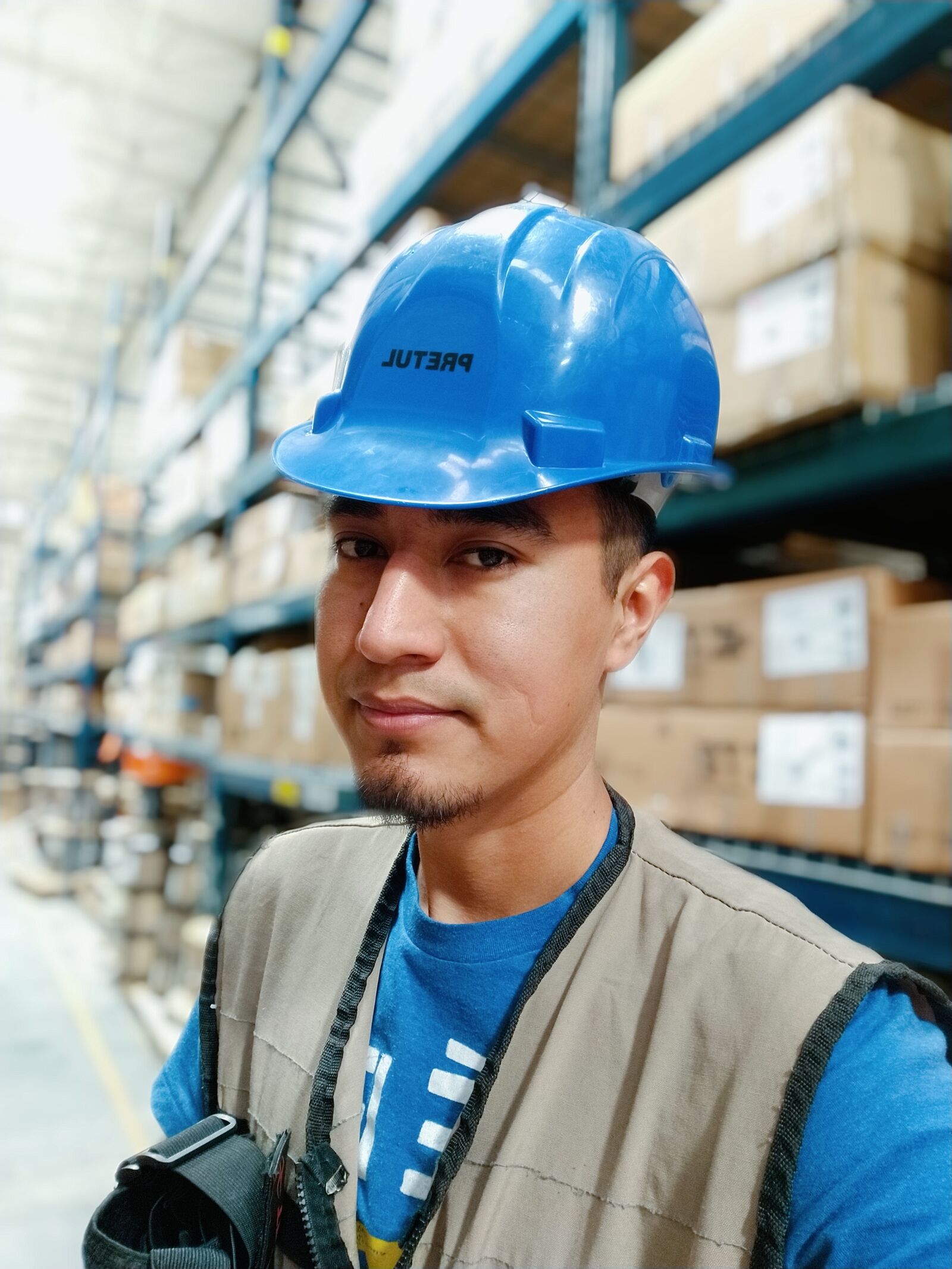 Xiaomi Mi A3 sample photo. Warehouse, security, vest photography