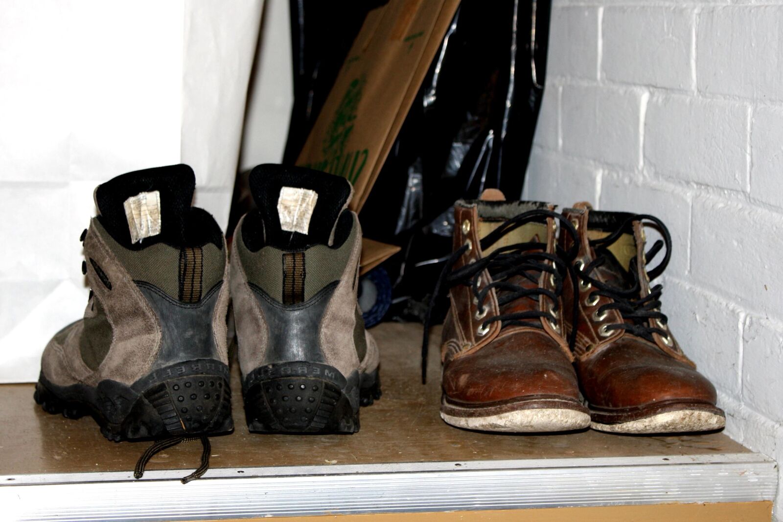 f/3.5-5.6 IS sample photo. Winter boots, storage, shelf photography