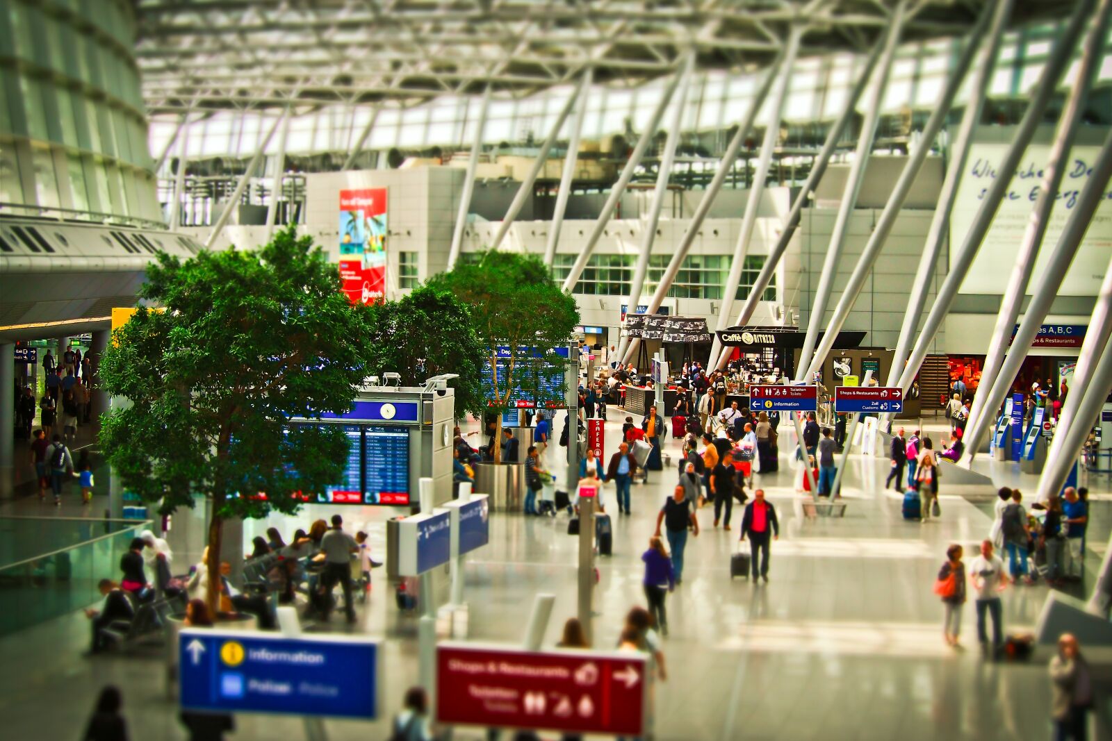 Olympus OM-D E-M10 sample photo. Airport, terminal, flying photography