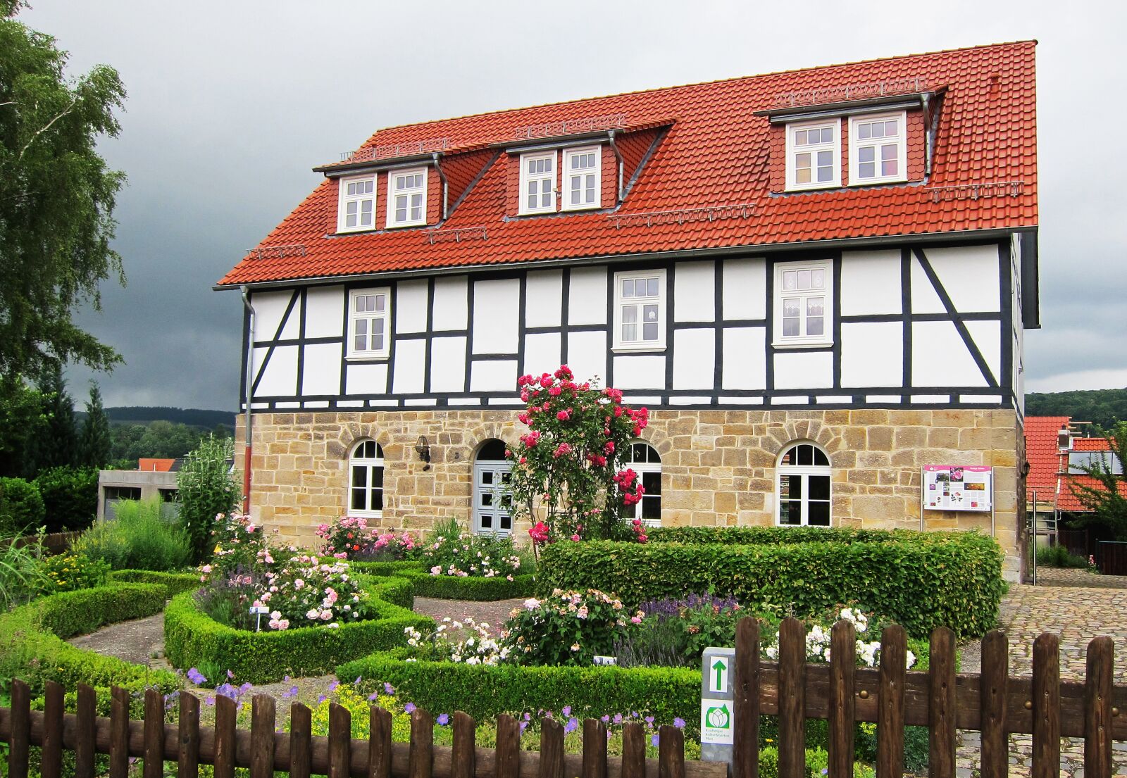 Canon PowerShot S95 sample photo. German, tudor, red roof photography