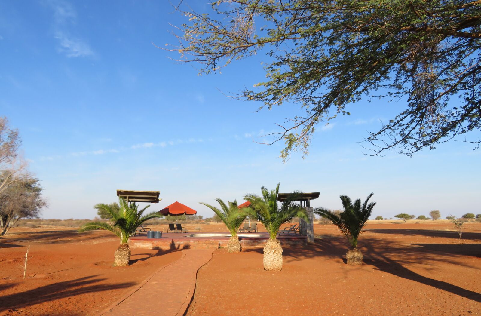 Canon PowerShot SX720 HS sample photo. Africa, lodge, swimming pool photography