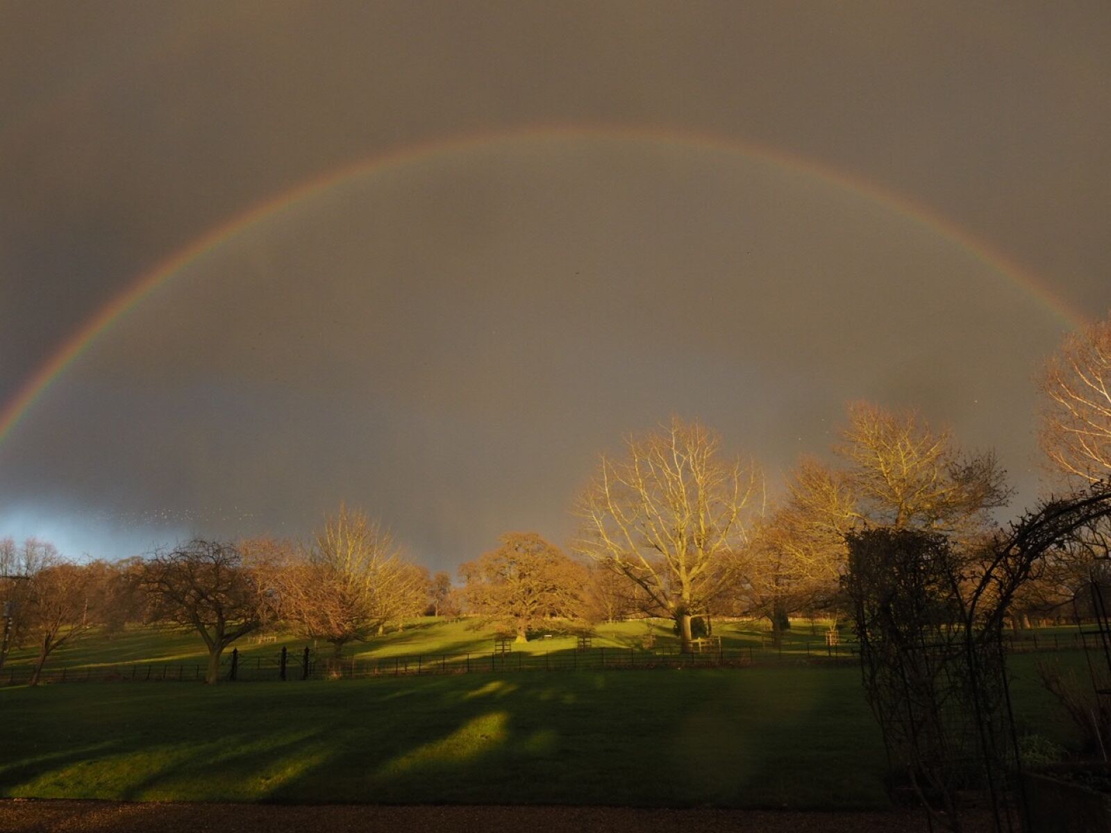 Olympus OM-D E-M1 sample photo. Rainbow, storm photography