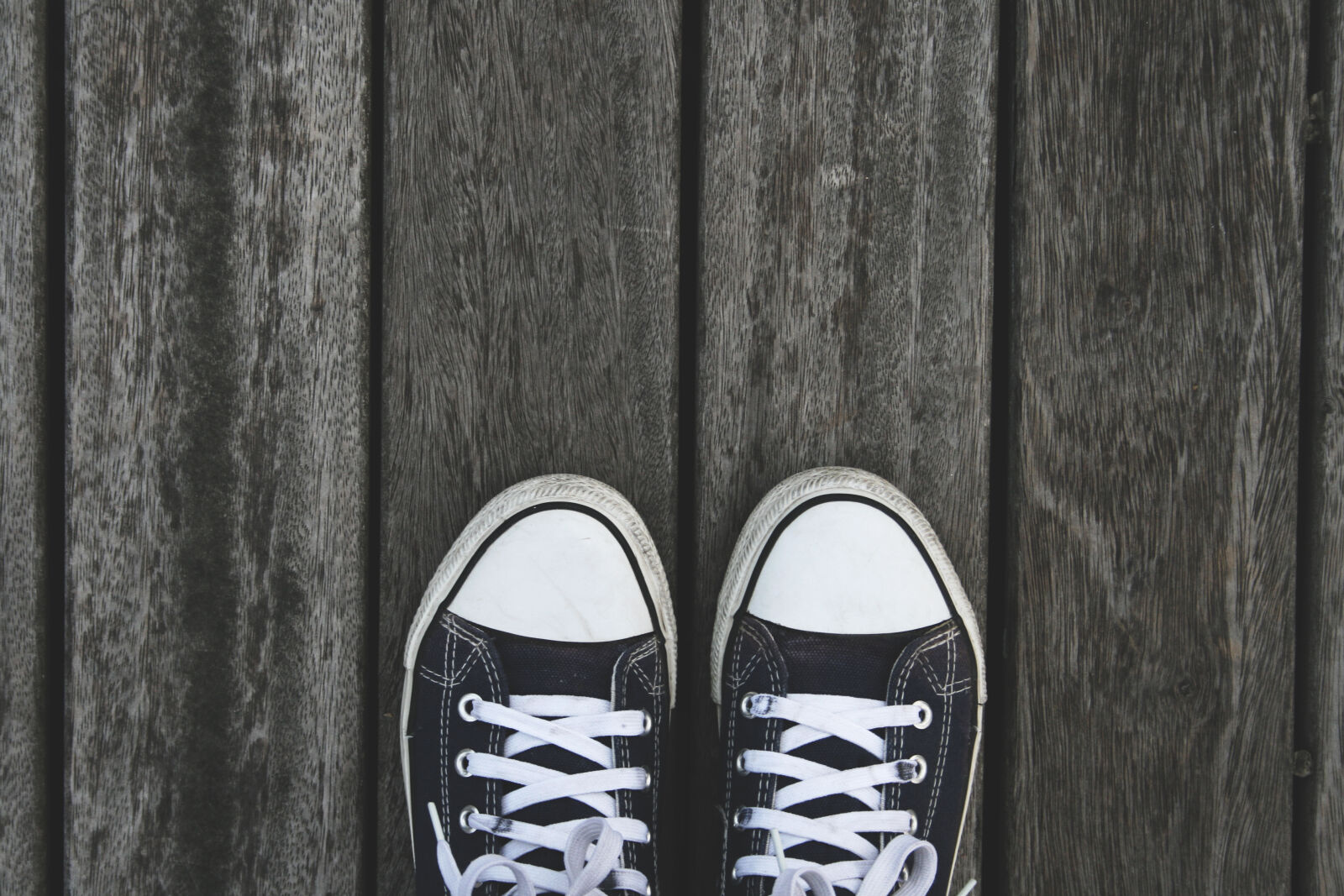Canon EF-S 18-55mm F3.5-5.6 II sample photo. Wood, shoes, pier photography