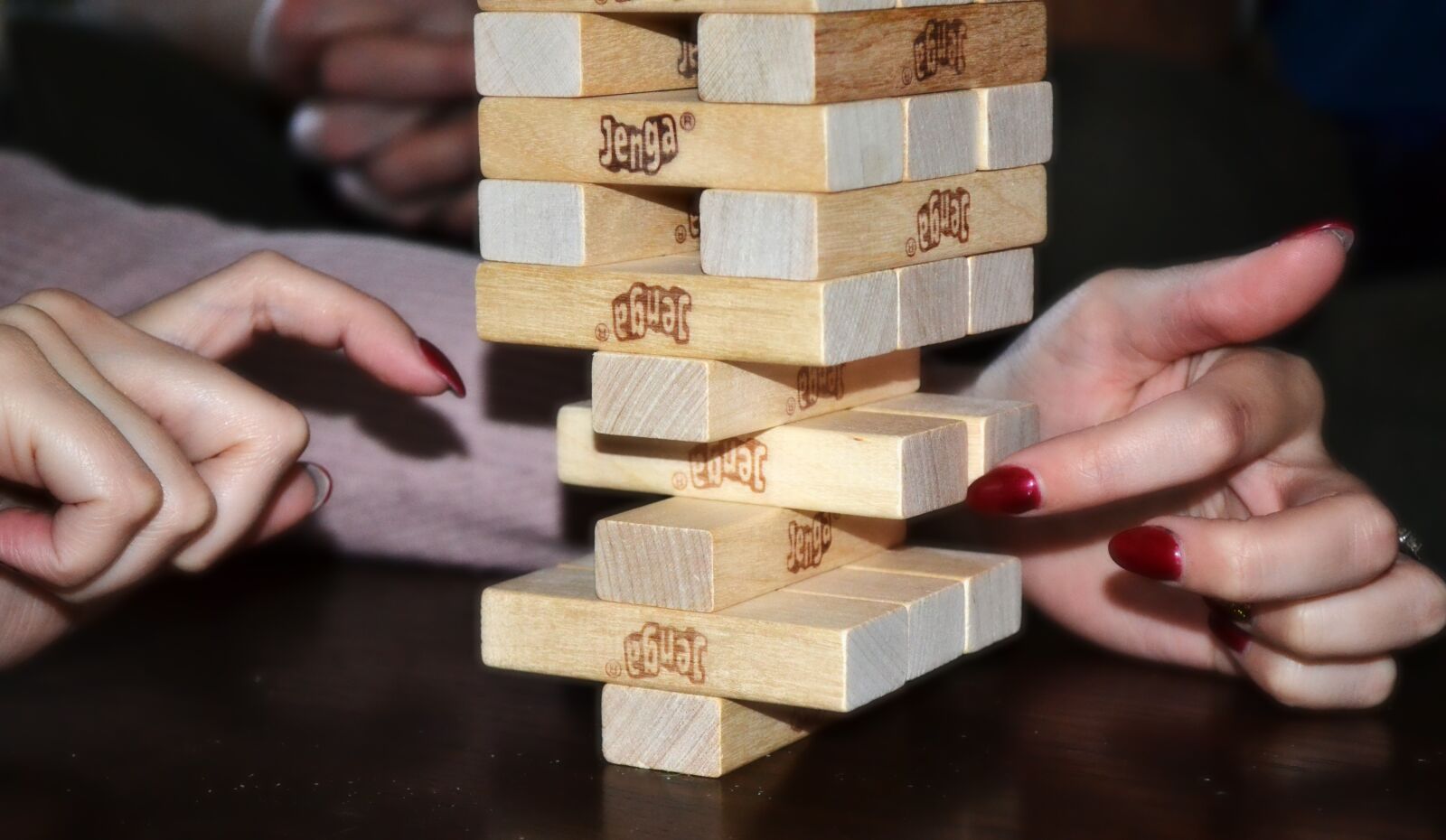Nikon D3100 sample photo. Jenga, balance, sensitivity photography
