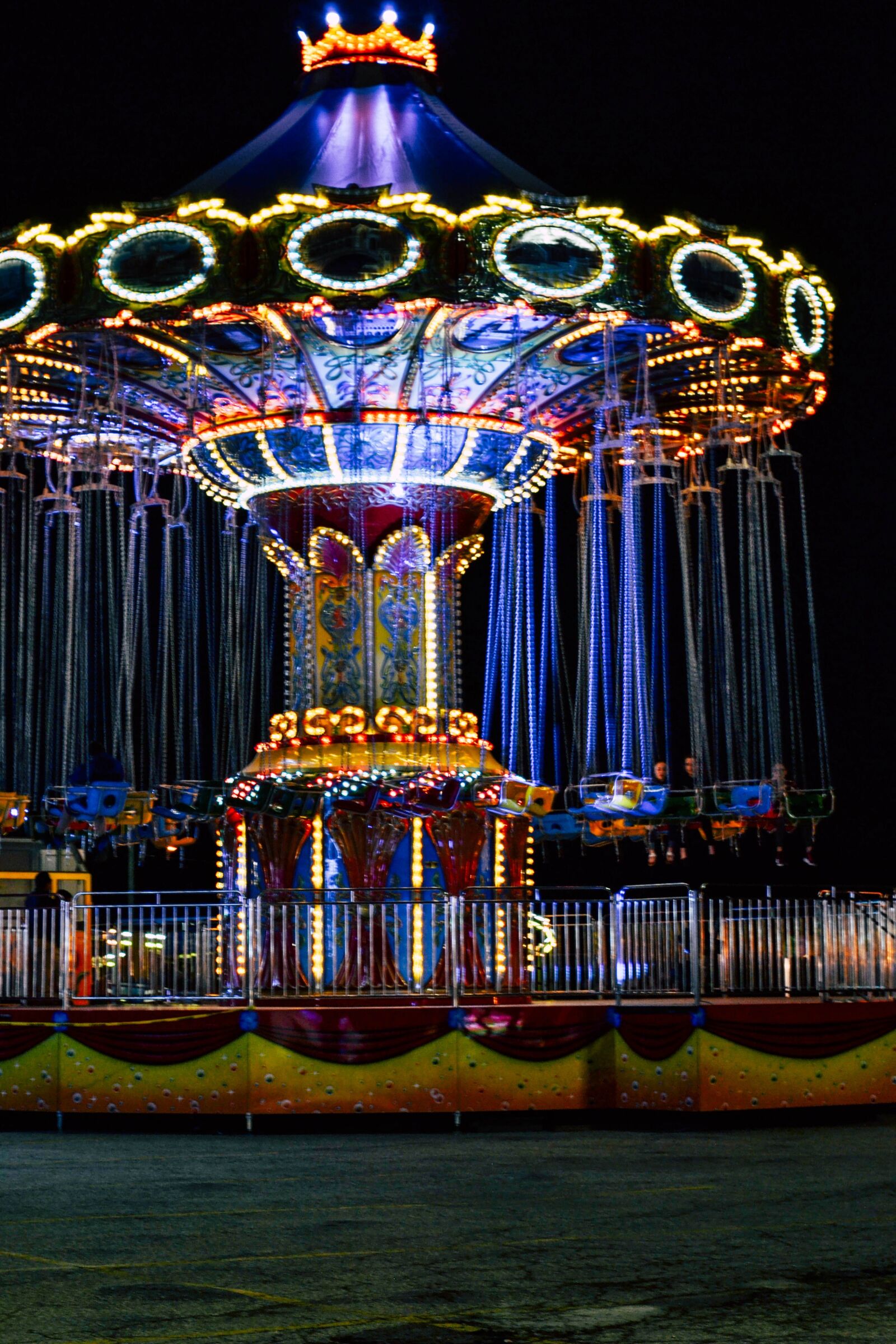 Nikon D3100 + Nikon AF-S Nikkor 50mm F1.8G sample photo. Carnival, carnival ride, swing photography