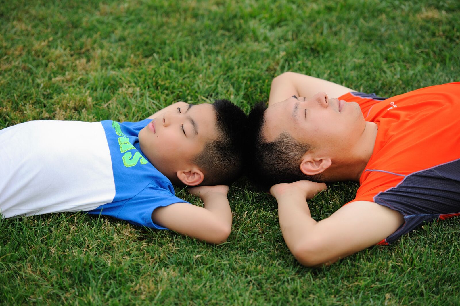 Nikon D700 sample photo. Football, teenager, greenery photography