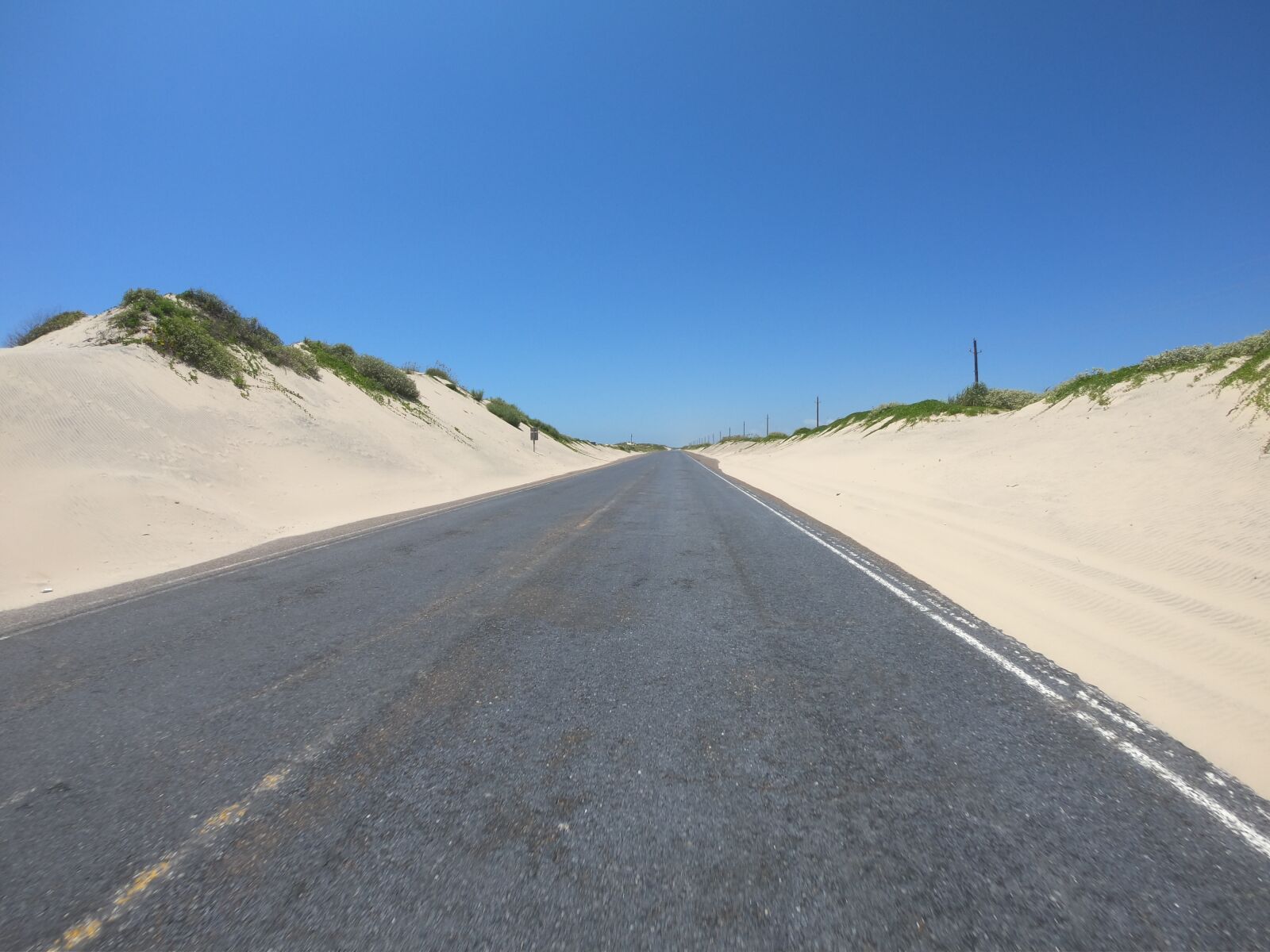 GoPro Hero6 Black sample photo. Road, sand dunes, south photography