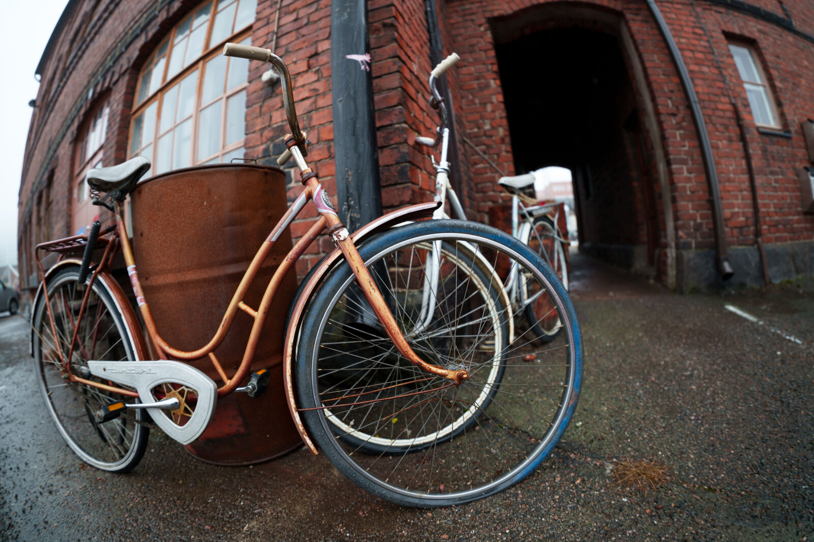 Sigma 15mm F1.4 DG DN Diagonal Fisheye Art sample photo. Old bicycle parking photography