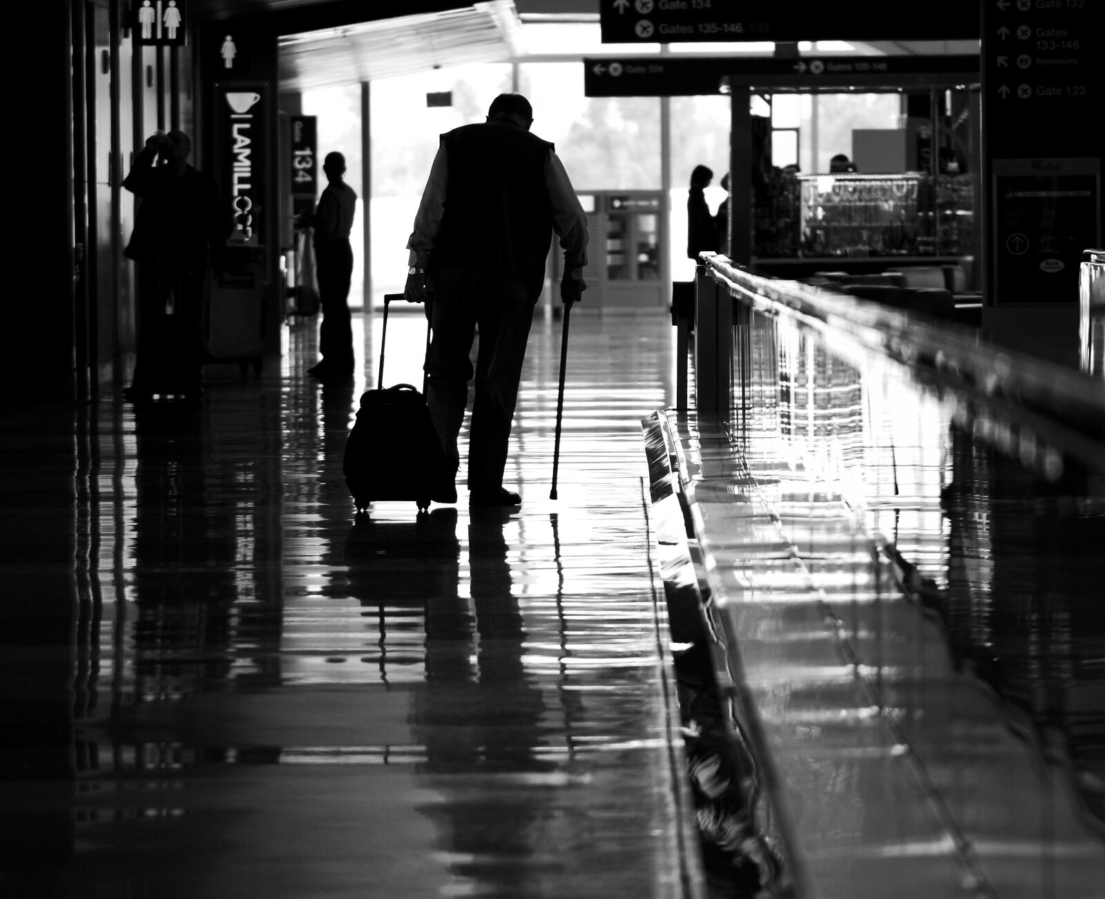 NX 50-200mm F4-5.6 sample photo. Silhouette, airport, bw photography
