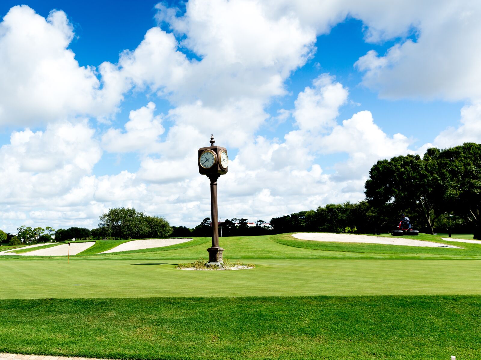 Canon EF 24-70mm F2.8L II USM sample photo. Golf course, green, clock photography