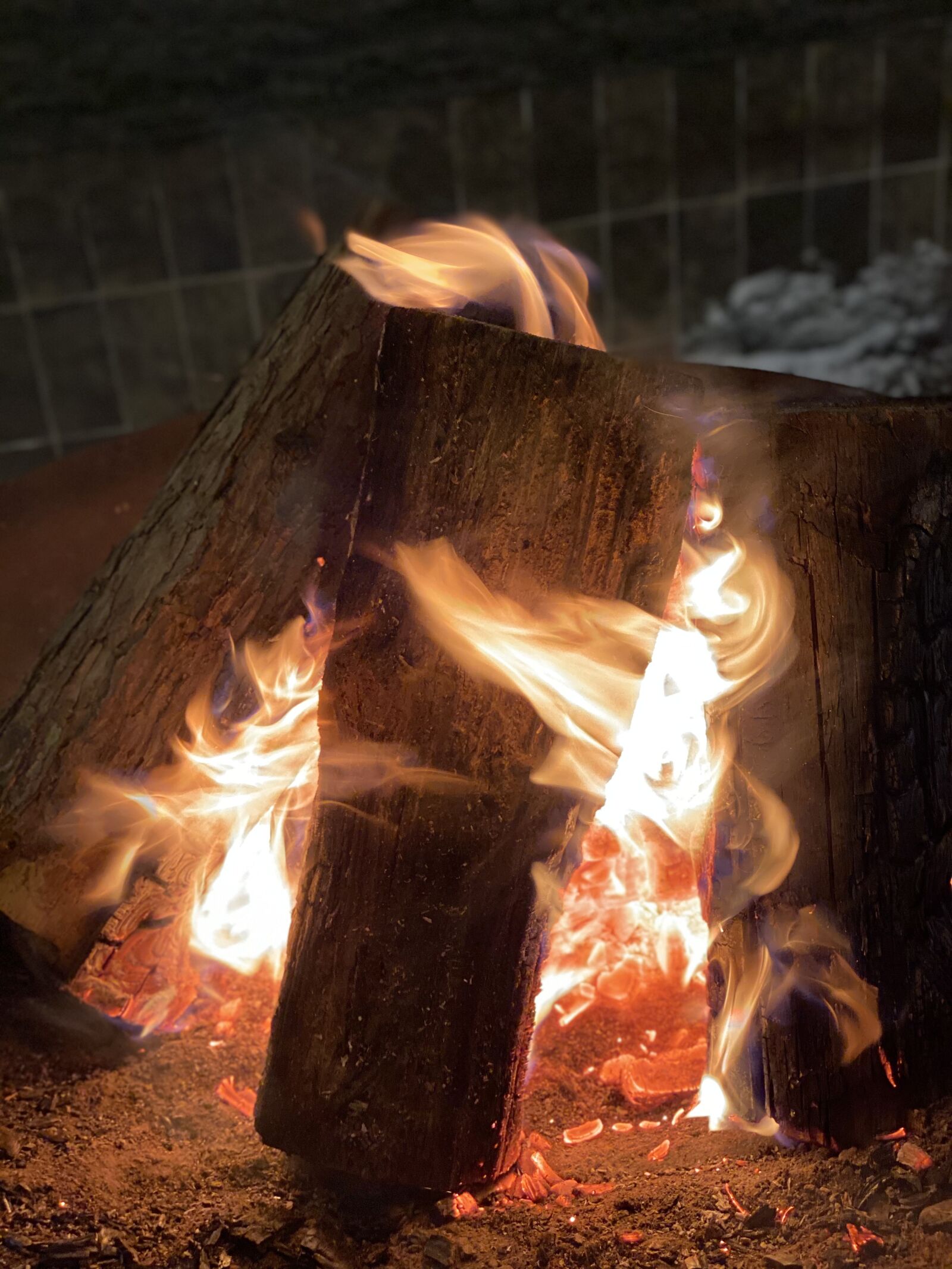 iPhone 11 Pro back dual camera 6mm f/2 sample photo. Fire, wood, flame photography