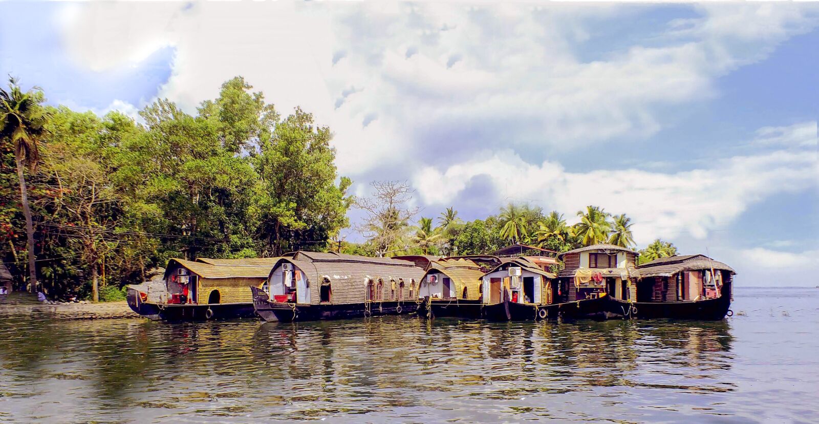 Fujifilm FinePix HS30EXR sample photo. House boat, water, lake photography