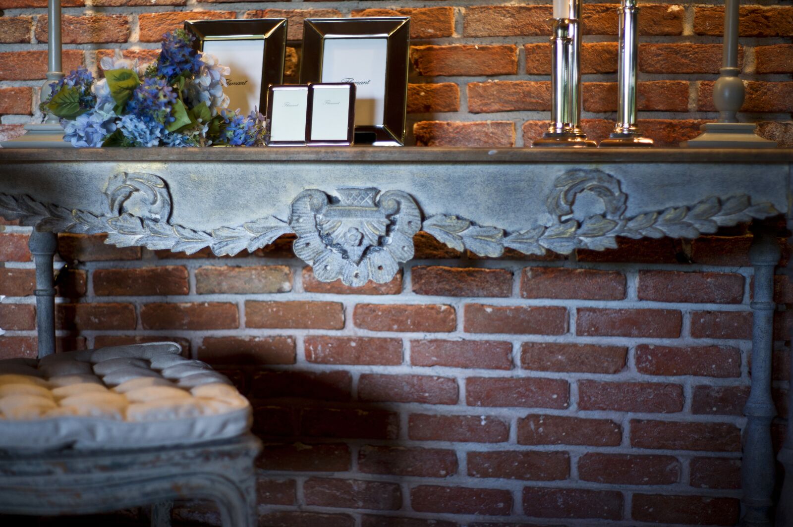 Sony Alpha DSLR-A850 sample photo. Wall, chair, brick photography