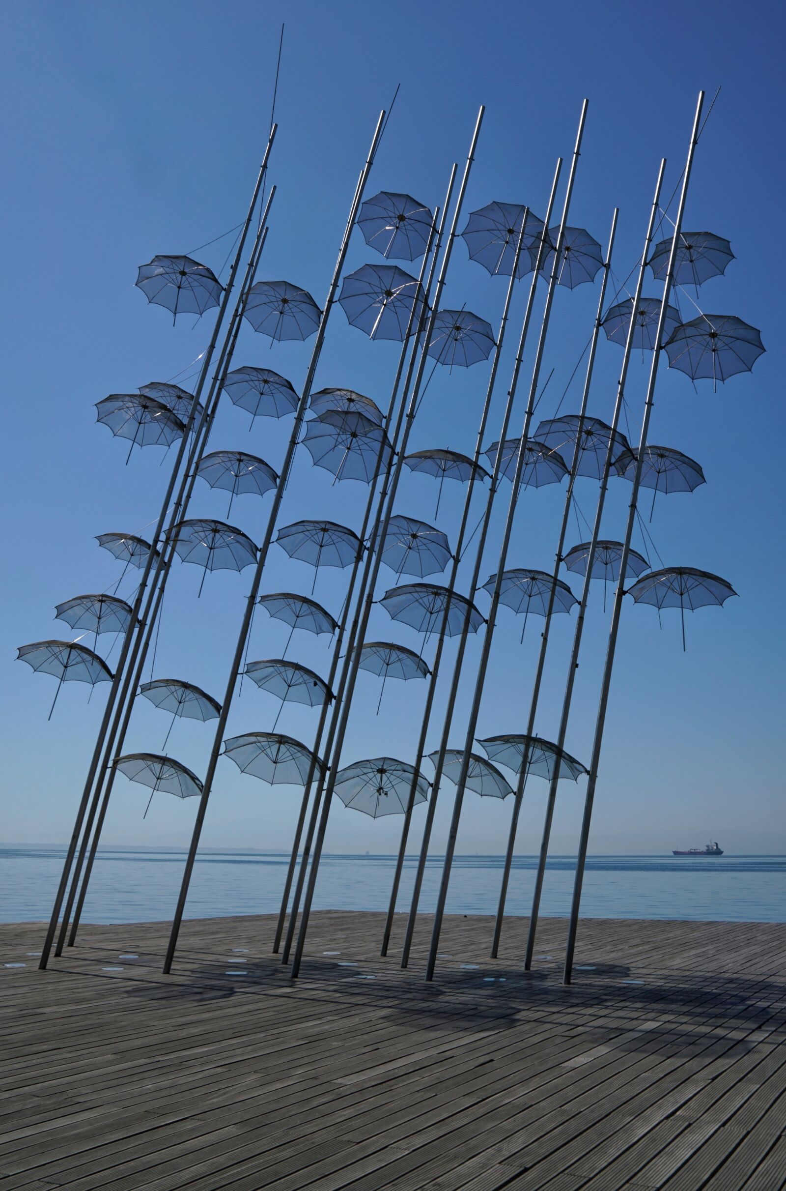 Sony a7R II + Sony FE 24-70mm F2.8 GM sample photo. Thessaloniki, umbrella, sculpture photography
