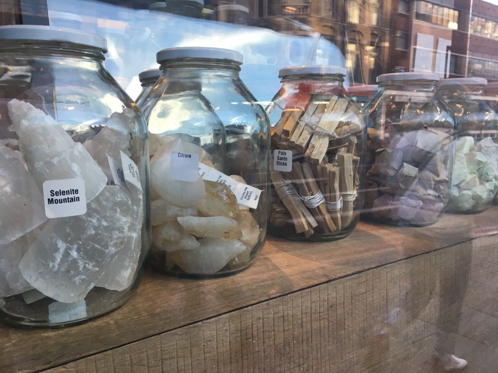 Apple iPhone 6s sample photo. Bottles, coffeshop, display, gemstones photography