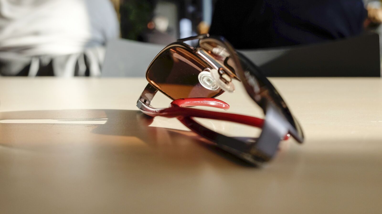 Fujifilm X70 sample photo. Sunglasses, shades, table photography