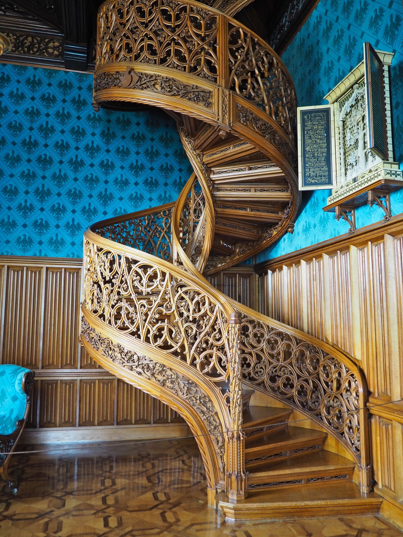 Olympus PEN E-PL8 sample photo. Wooden spiral staircase, castle photography
