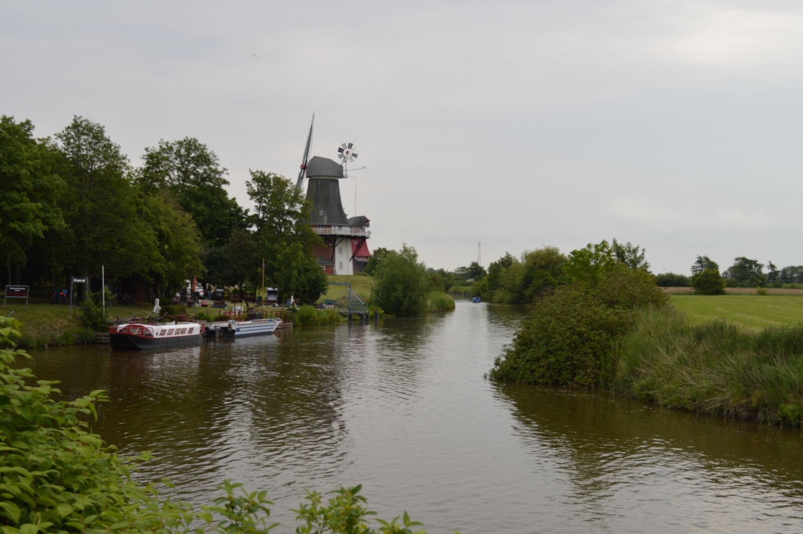 Nikon D3200 sample photo. Windmill, siel, water photography