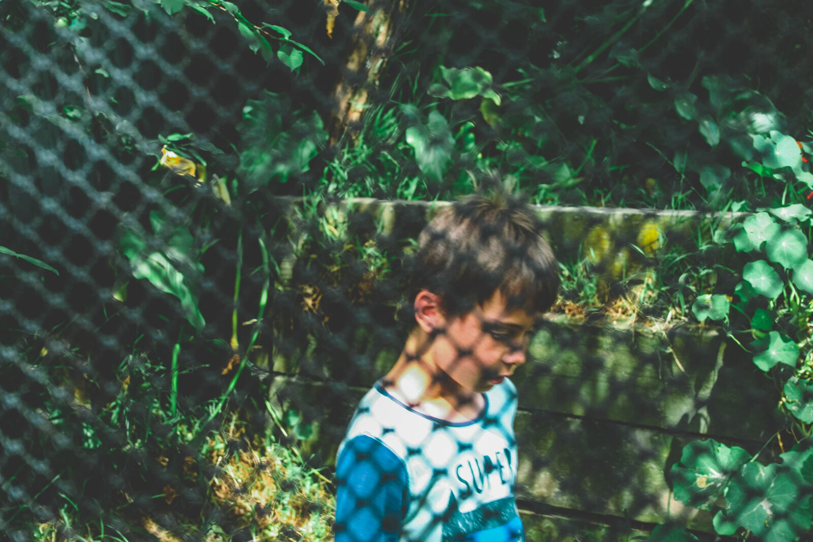 Canon EOS 20D sample photo. Blur, blurred, background, boy photography
