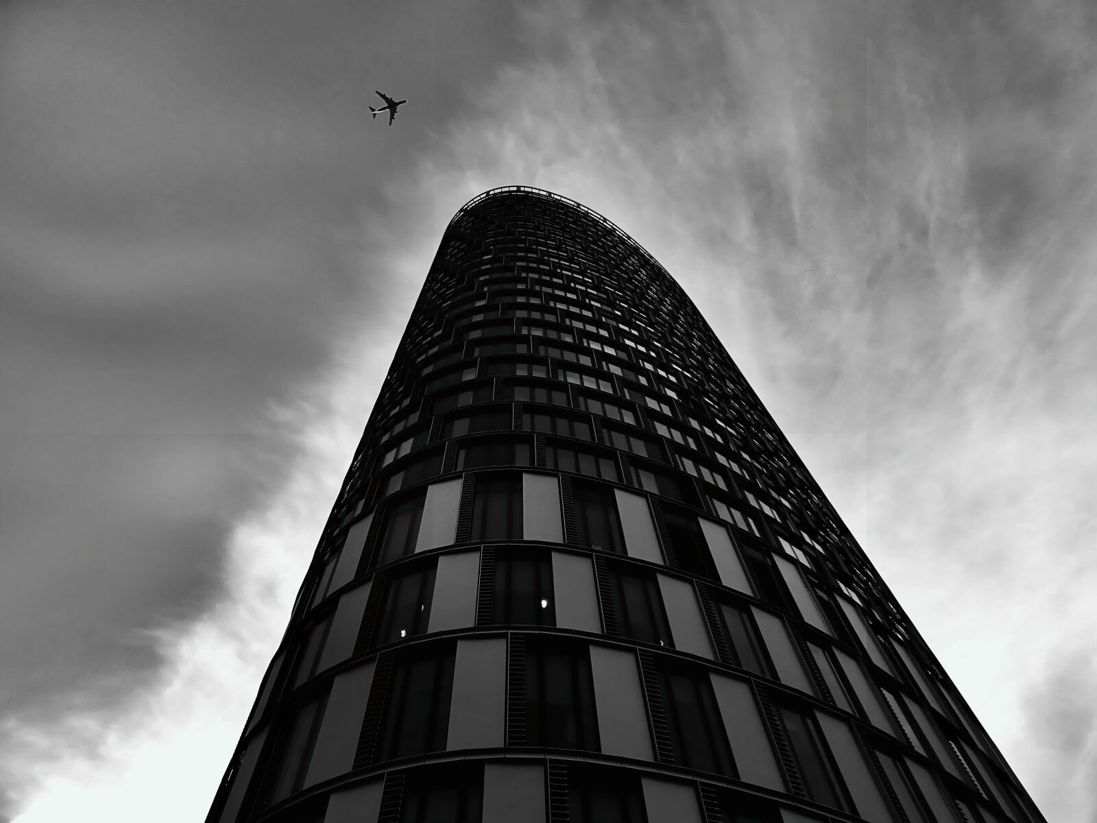 Sony DSC-HX60 sample photo. Airplane, architecture, black, and photography