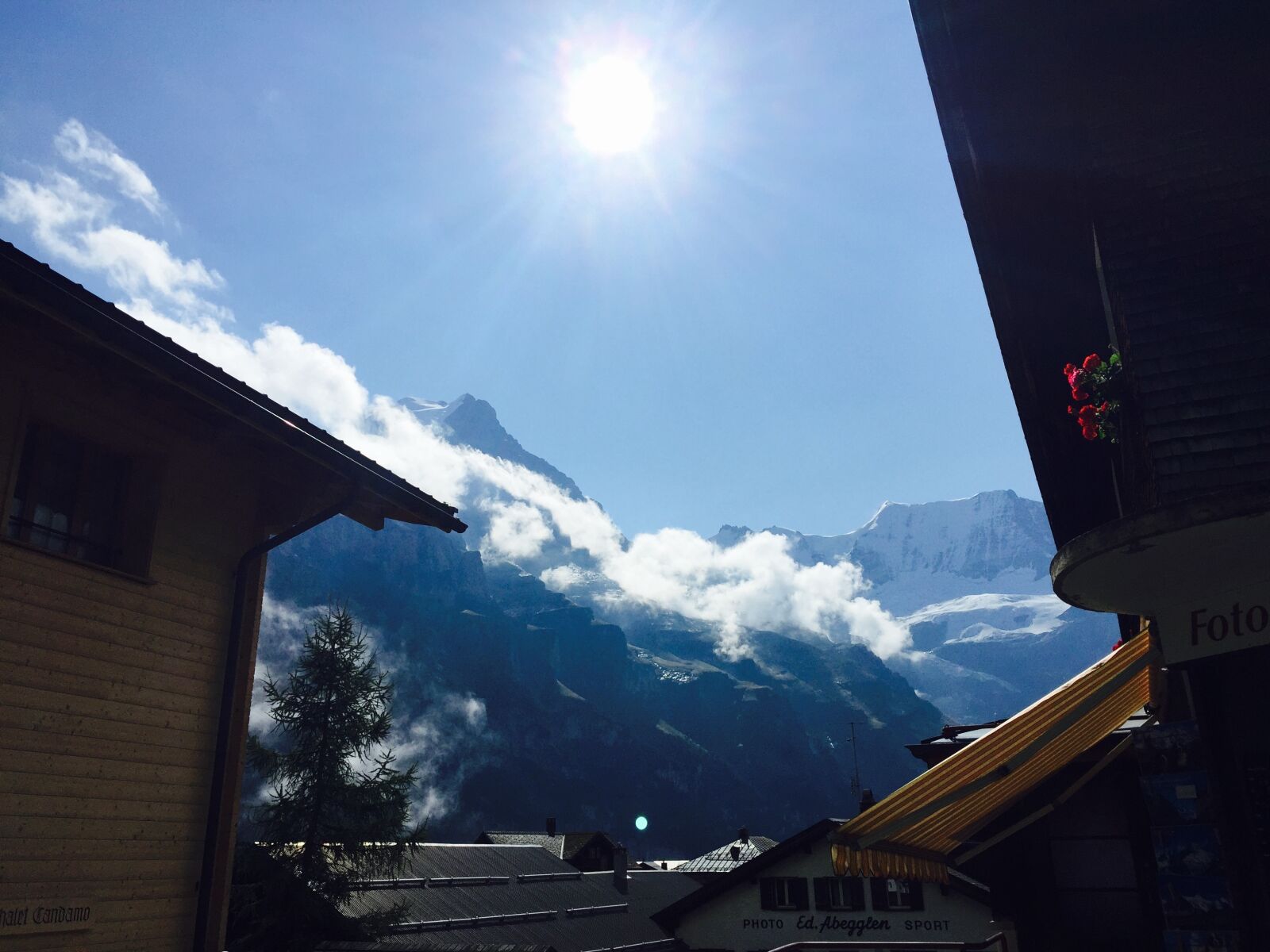 iPhone 6 Plus back camera 4.15mm f/2.2 sample photo. Swiss, summer snow, sky photography