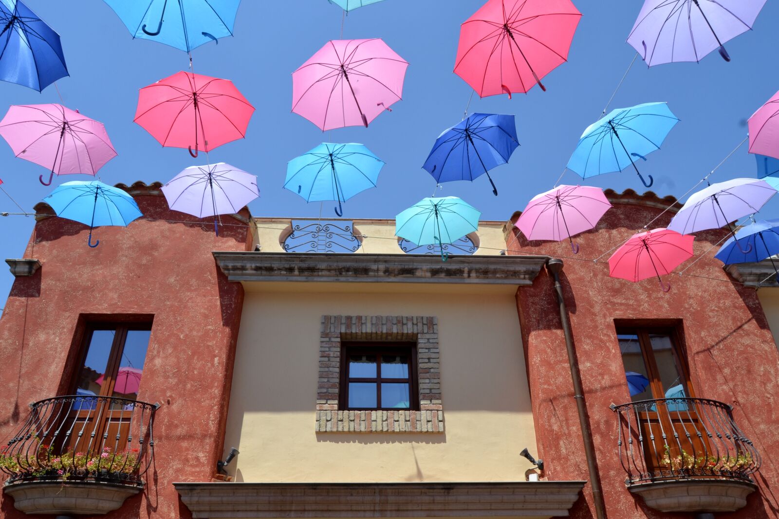 Nikon D3100 sample photo. Sardinia, pula, umbrellas photography
