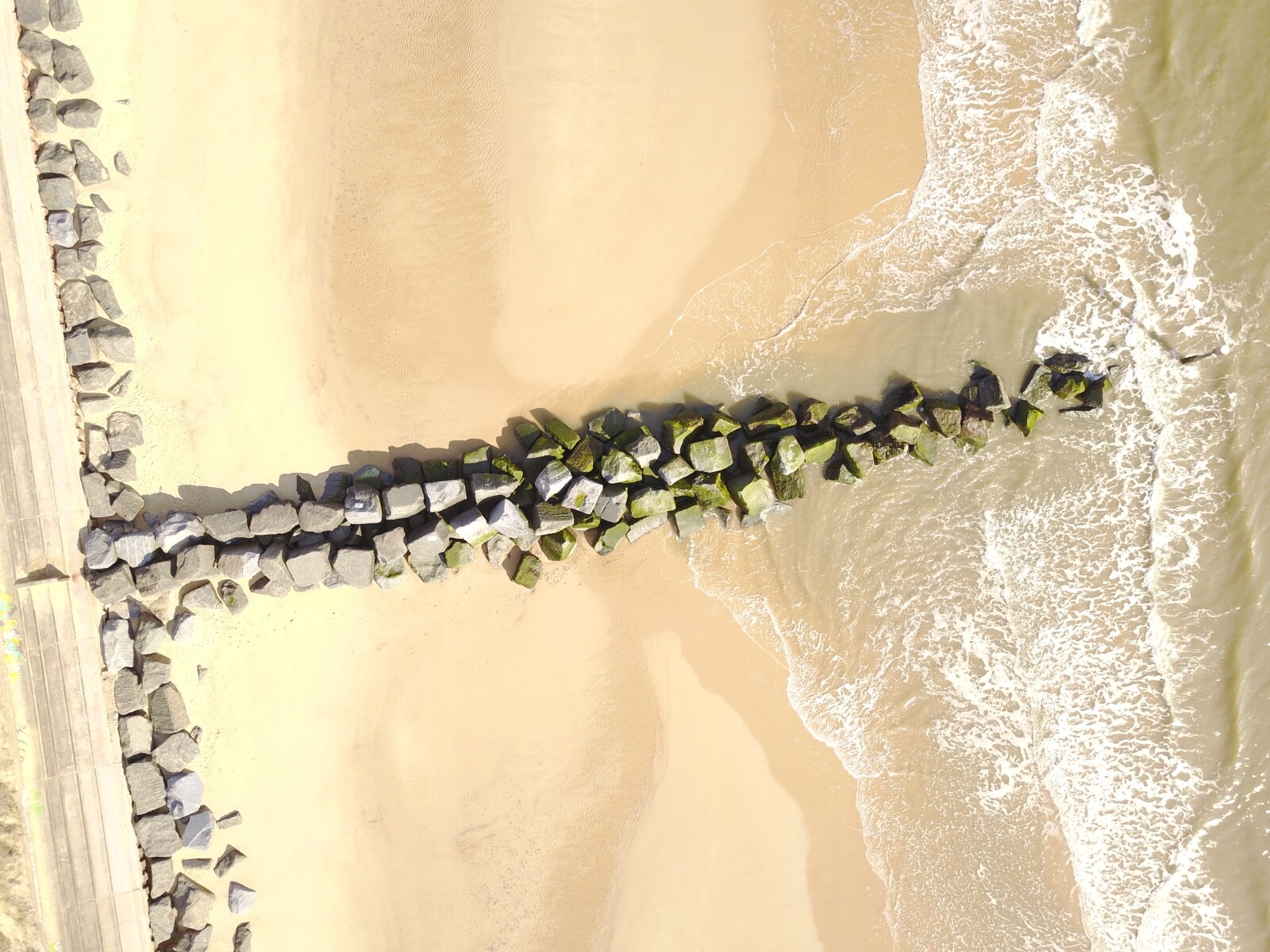 DJI FC220 sample photo. Beach, low, tide, rocks photography