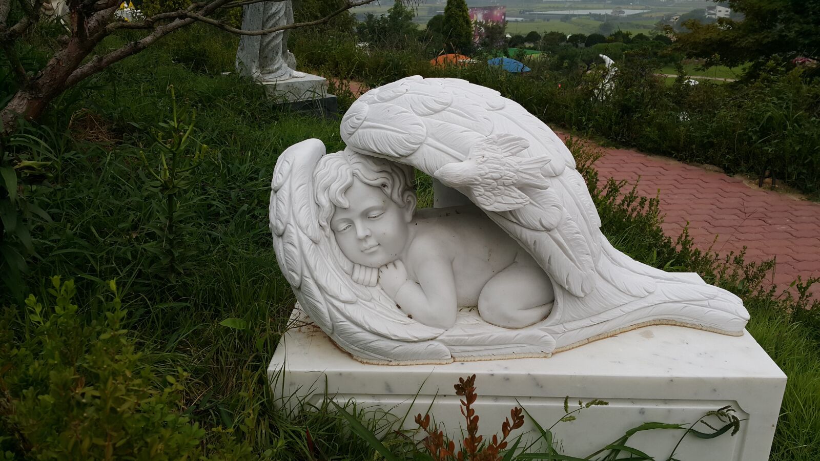 Samsung Galaxy Note4 sample photo. Statue, cherub, a baby photography