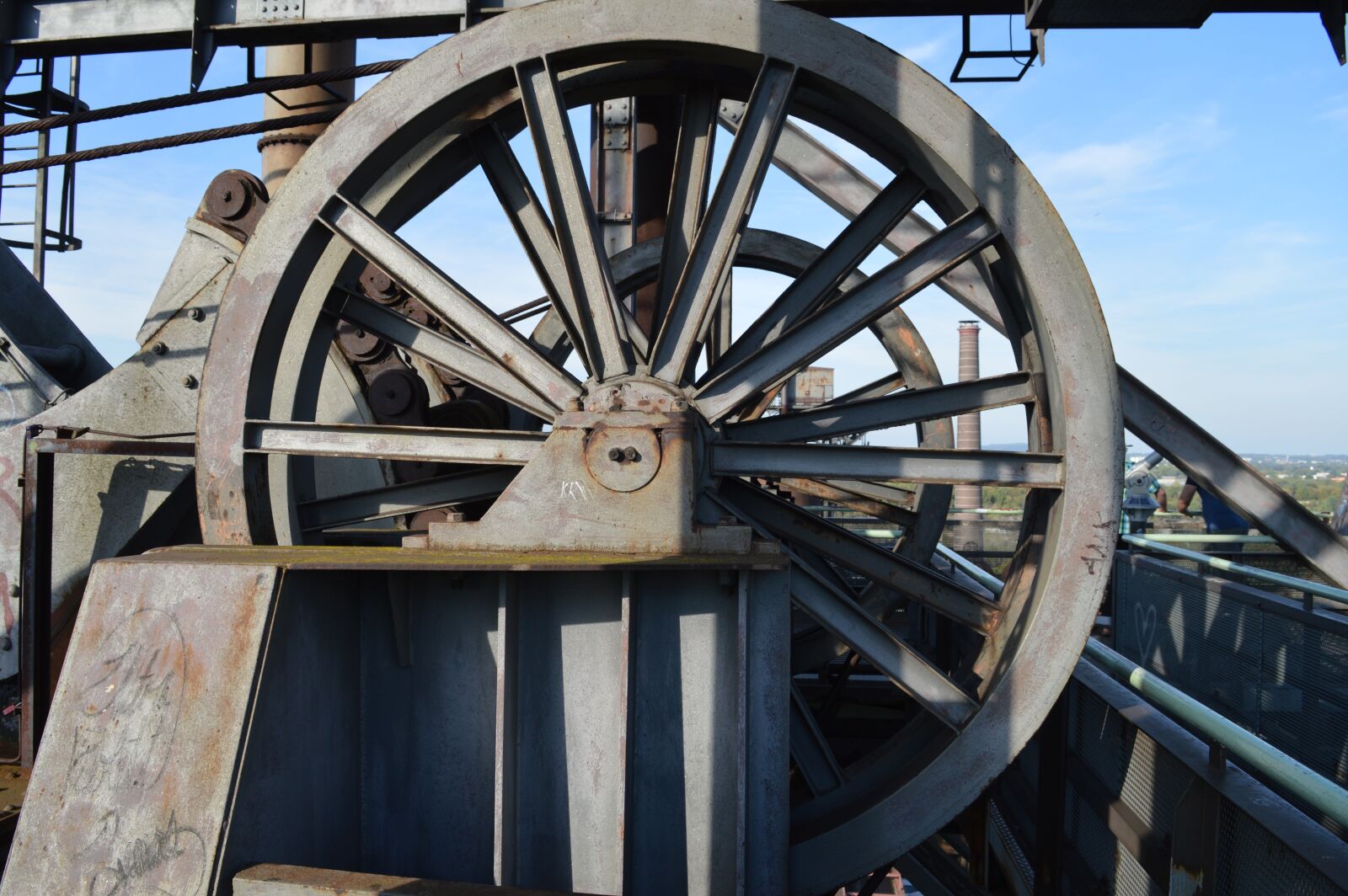 Nikon D3200 sample photo. Conveyor wheel, spoke, sky photography