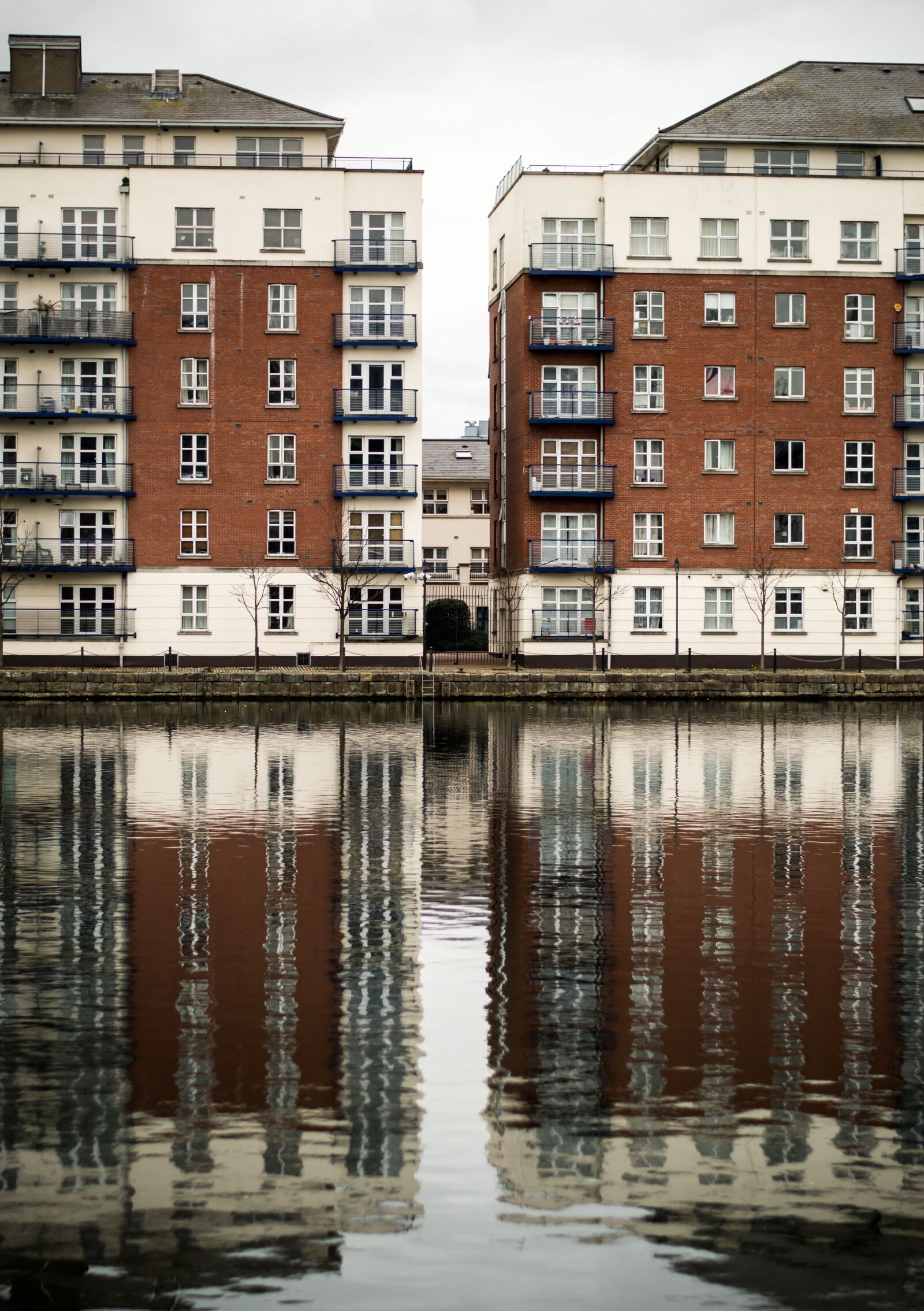 Nikon D3200 sample photo. Reflection, blocks, buildings photography