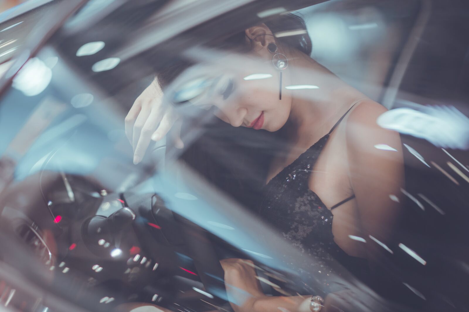 Canon EF 85mm F1.2L II USM sample photo. Woman in the car photography