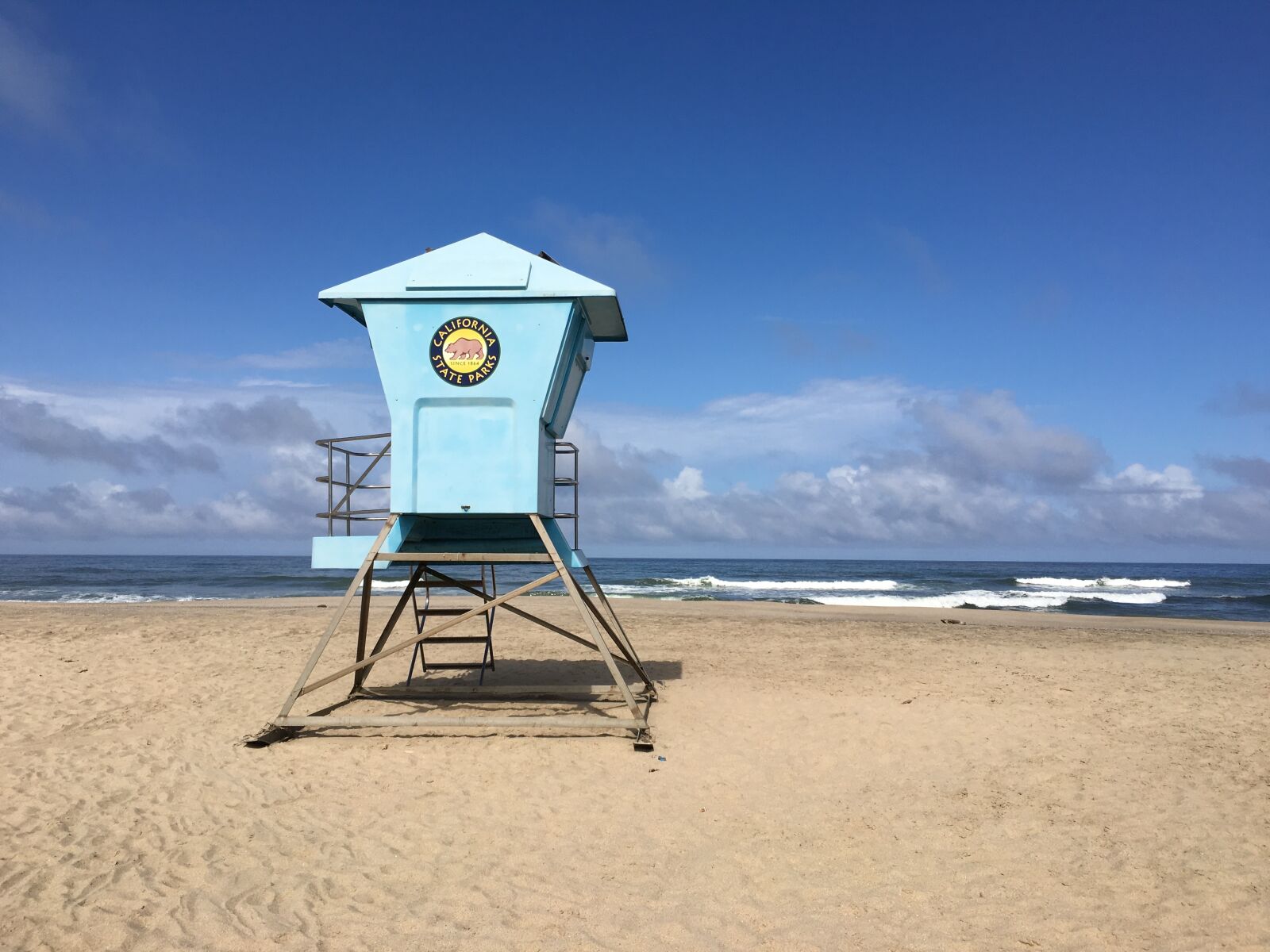 Apple iPhone 6s sample photo. Lifeguard, beach, water photography