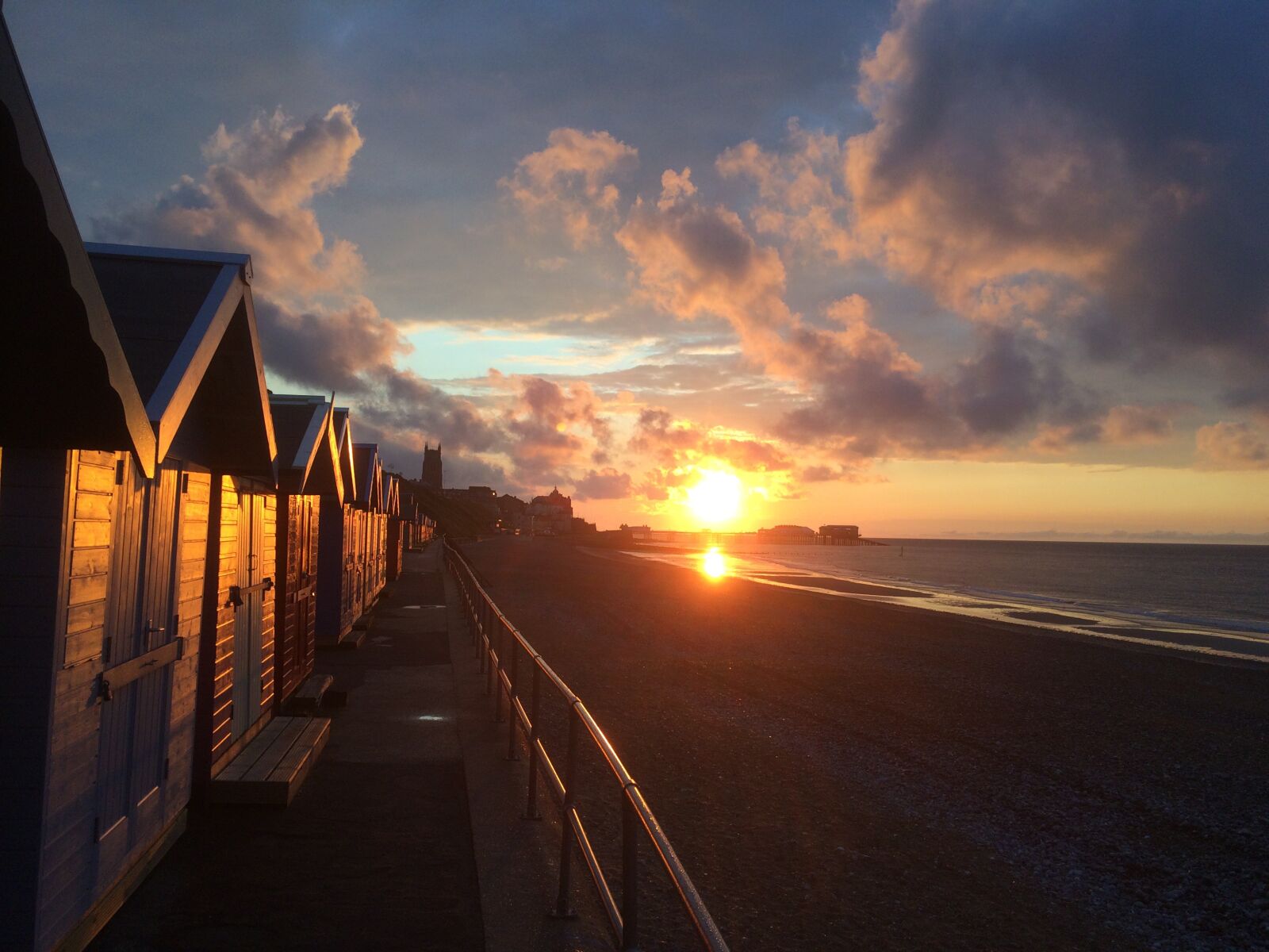 iPhone 5s back camera 4.15mm f/2.2 sample photo. Cromer, beach huts, sunset photography