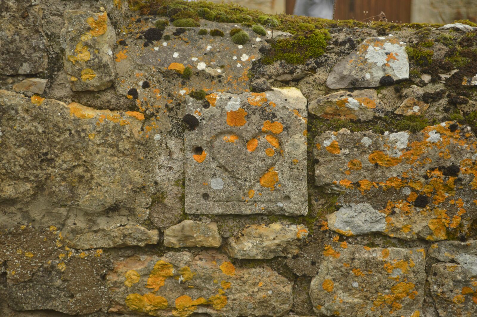 Nikon D3200 sample photo. Stone wall, engraved heart photography