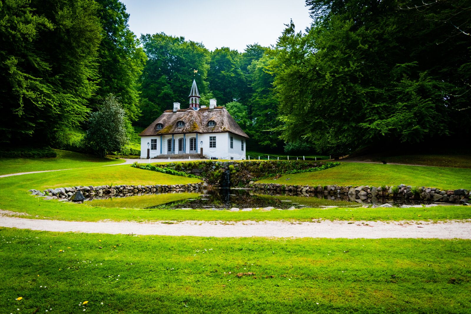 Nikon D5500 sample photo. Hillside, house, landscape photography