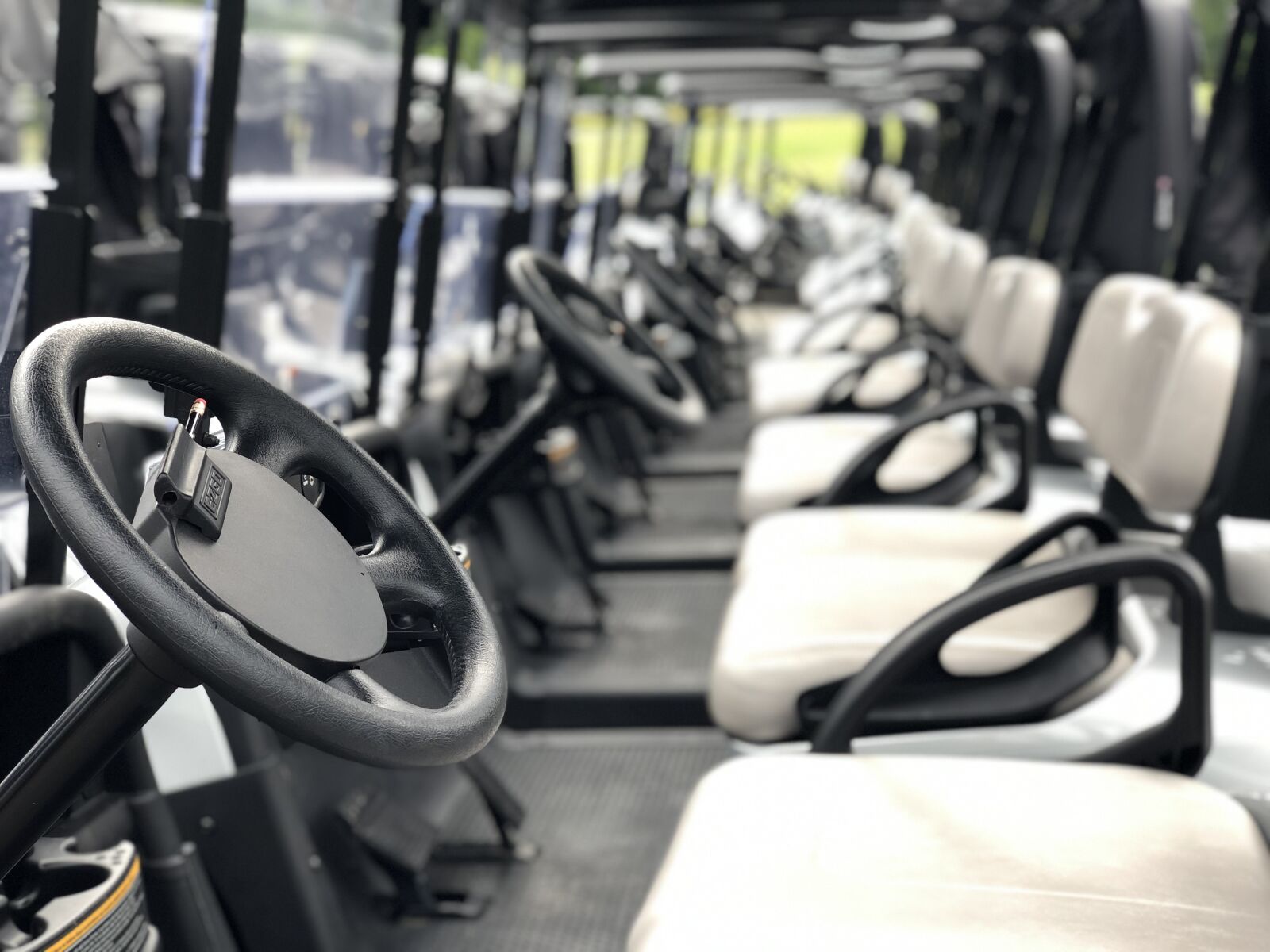 iPhone X back dual camera 6mm f/2.4 sample photo. Golf cart, electric, golf photography