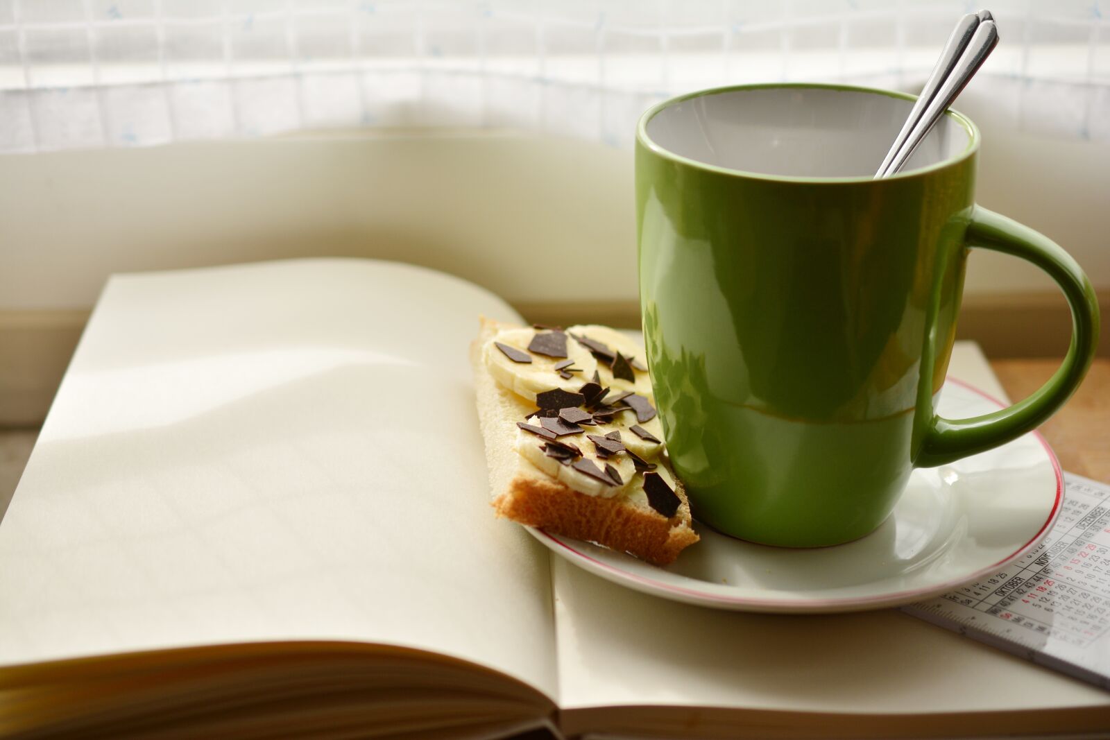 Nikon D5200 sample photo. Cup, book, breakfast photography