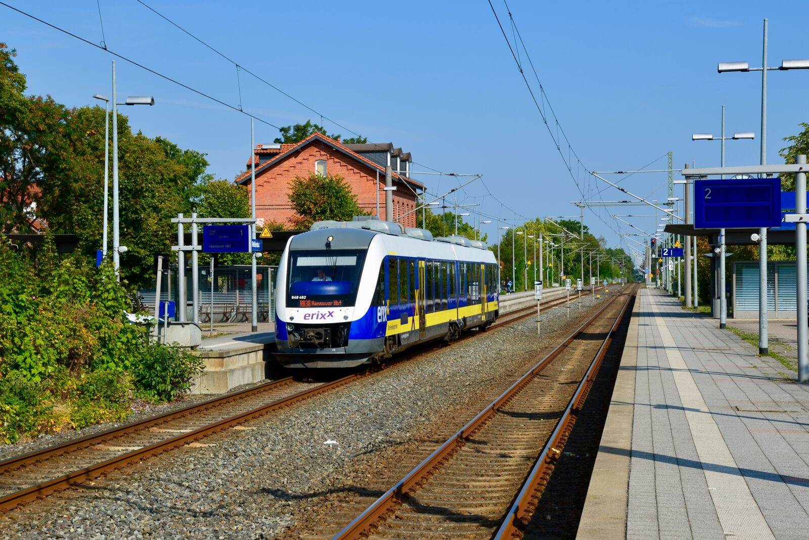 Nikon D610 sample photo. Train, railroad tracks, traffic photography
