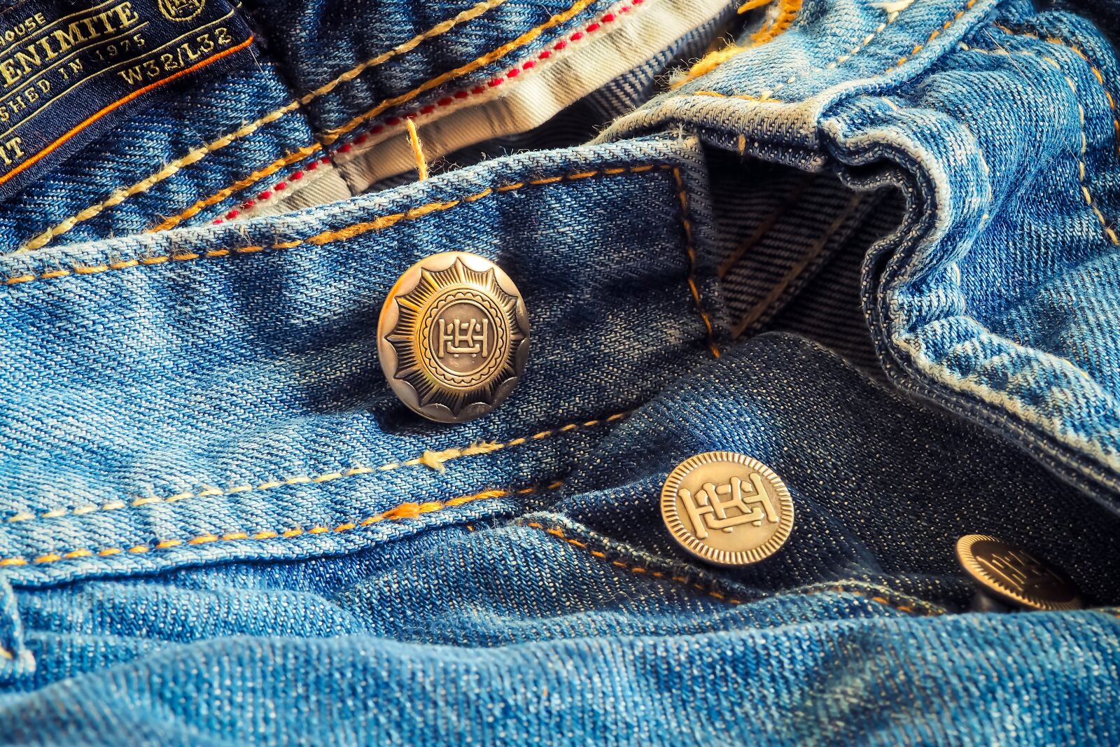 Olympus OM-D E-M10 sample photo. Jeans, pants, trouser buttons photography
