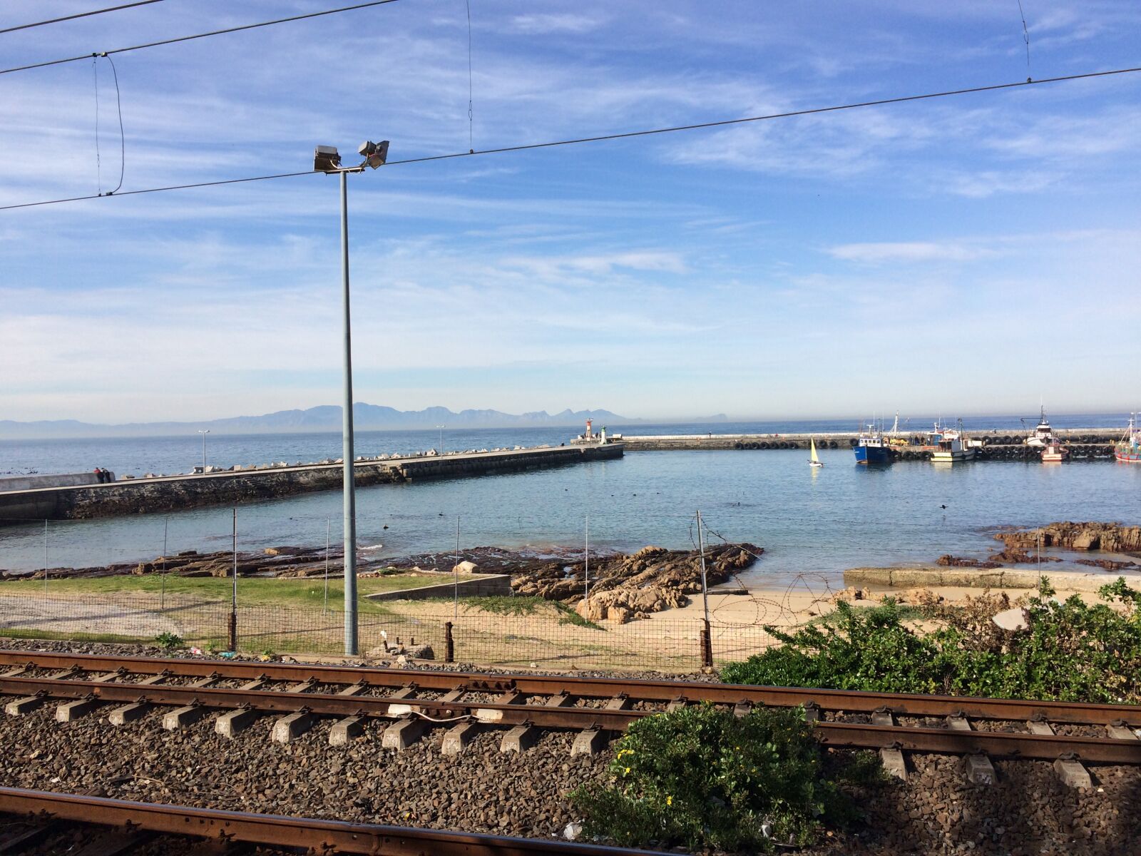 iPhone 5s back camera 4.15mm f/2.2 sample photo. Mountains, sea, train, tracks photography