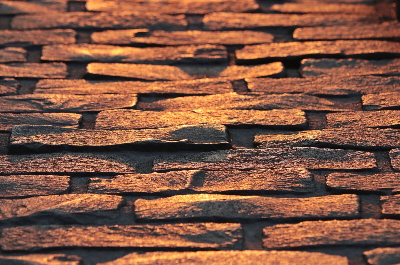 Canon EF-S 55-250mm F4-5.6 IS STM sample photo. Cobblestones, paving stones, patch photography