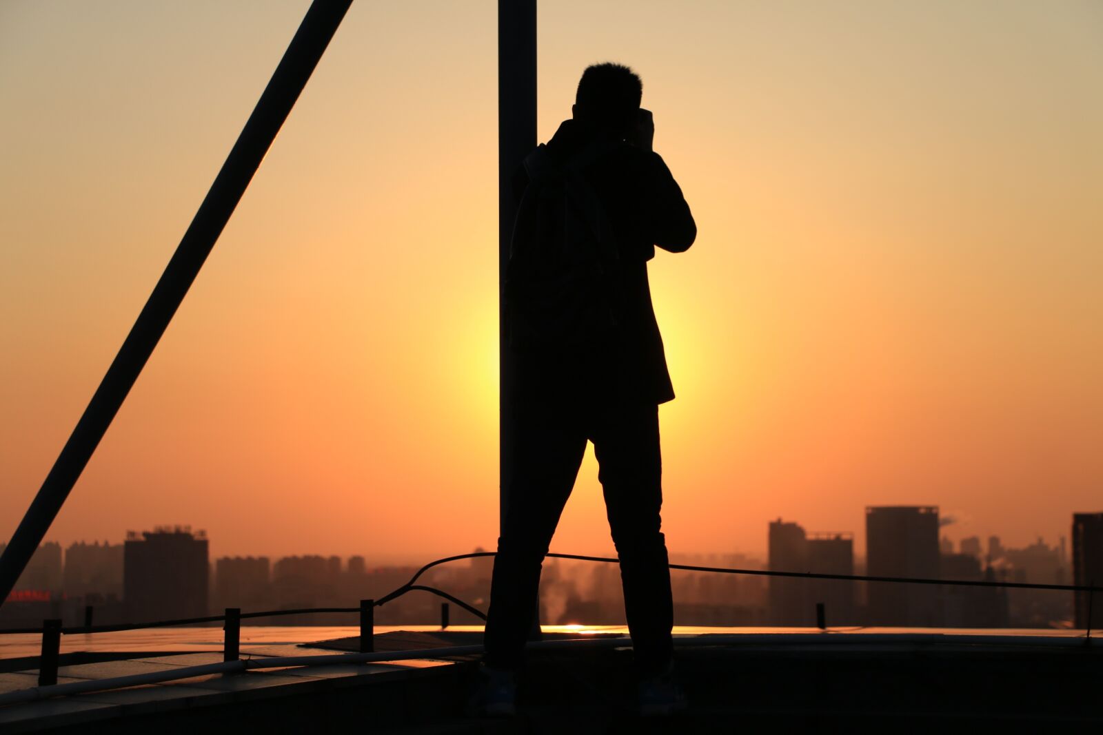Canon EOS 70D sample photo. Tall buildings, sunset, silhouette photography