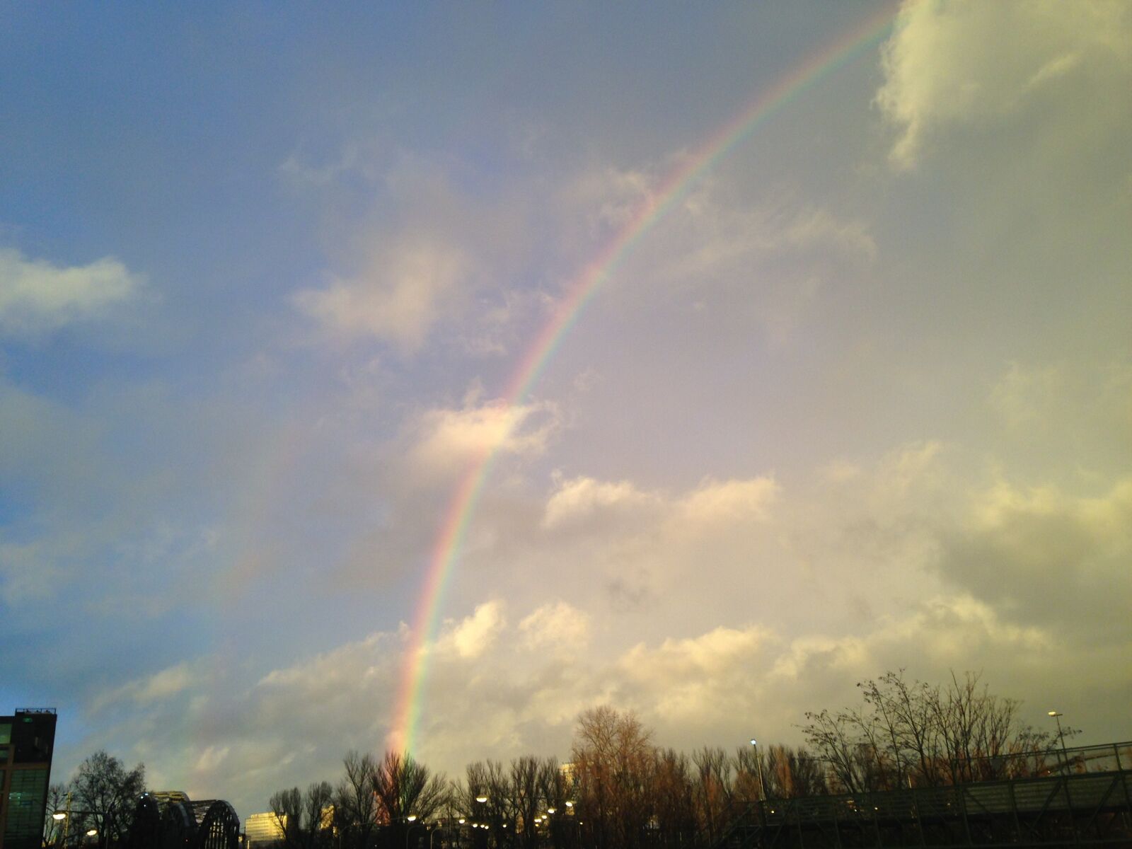 iPhone 5c back camera 4.12mm f/2.4 sample photo. Sky, rainbow, clouds photography