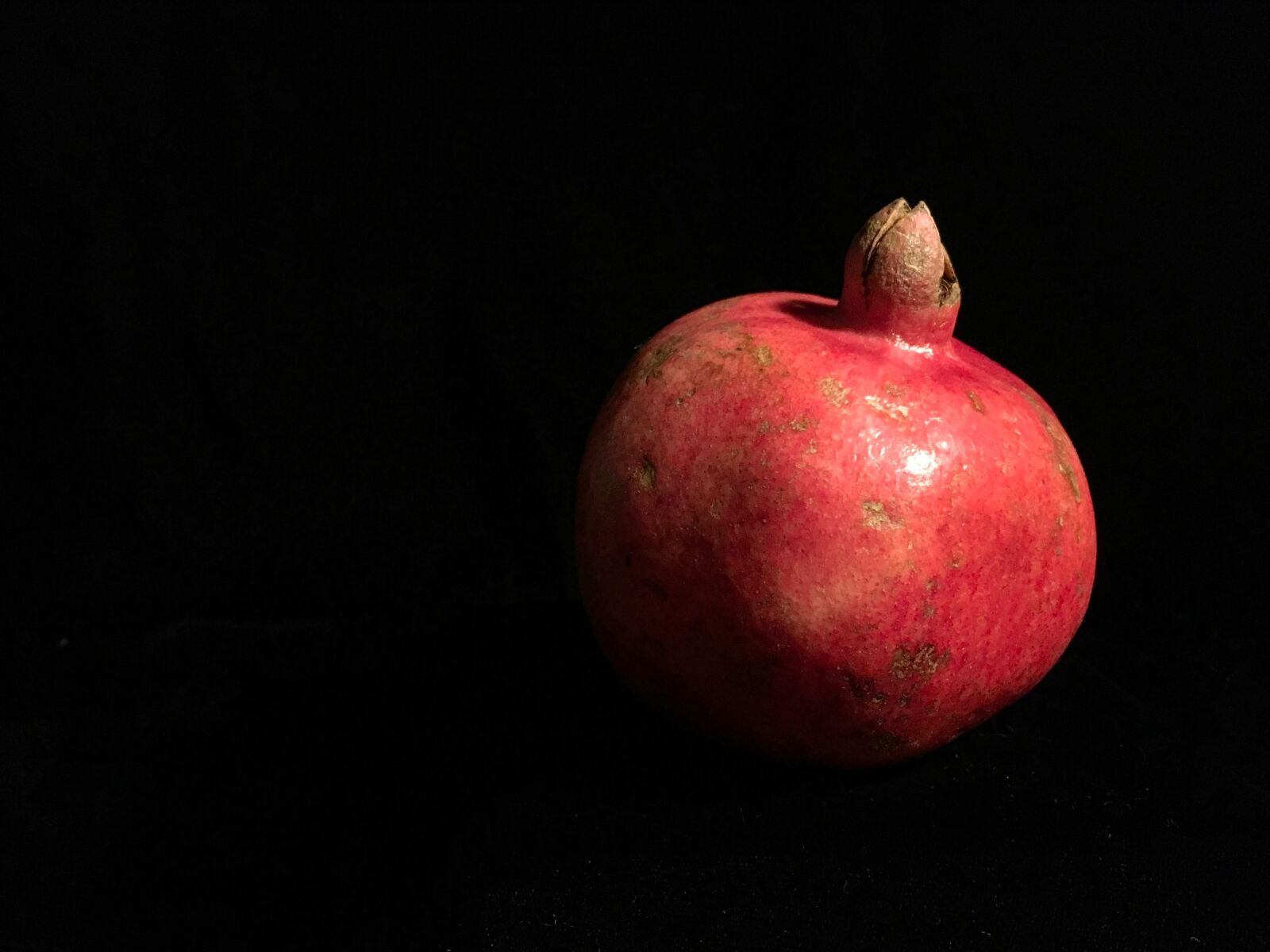 iPad Pro back camera 4.15mm f/2.2 sample photo. Pomegranate, red, black photography