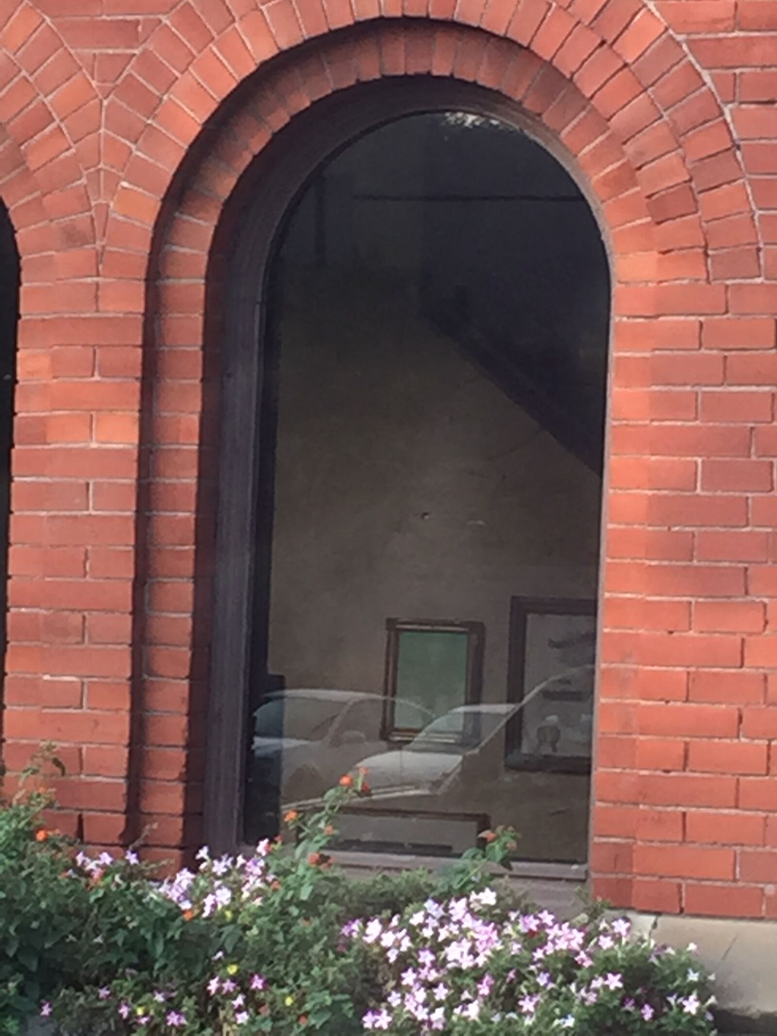 Apple iPhone 6 sample photo. Arched, window, brick photography