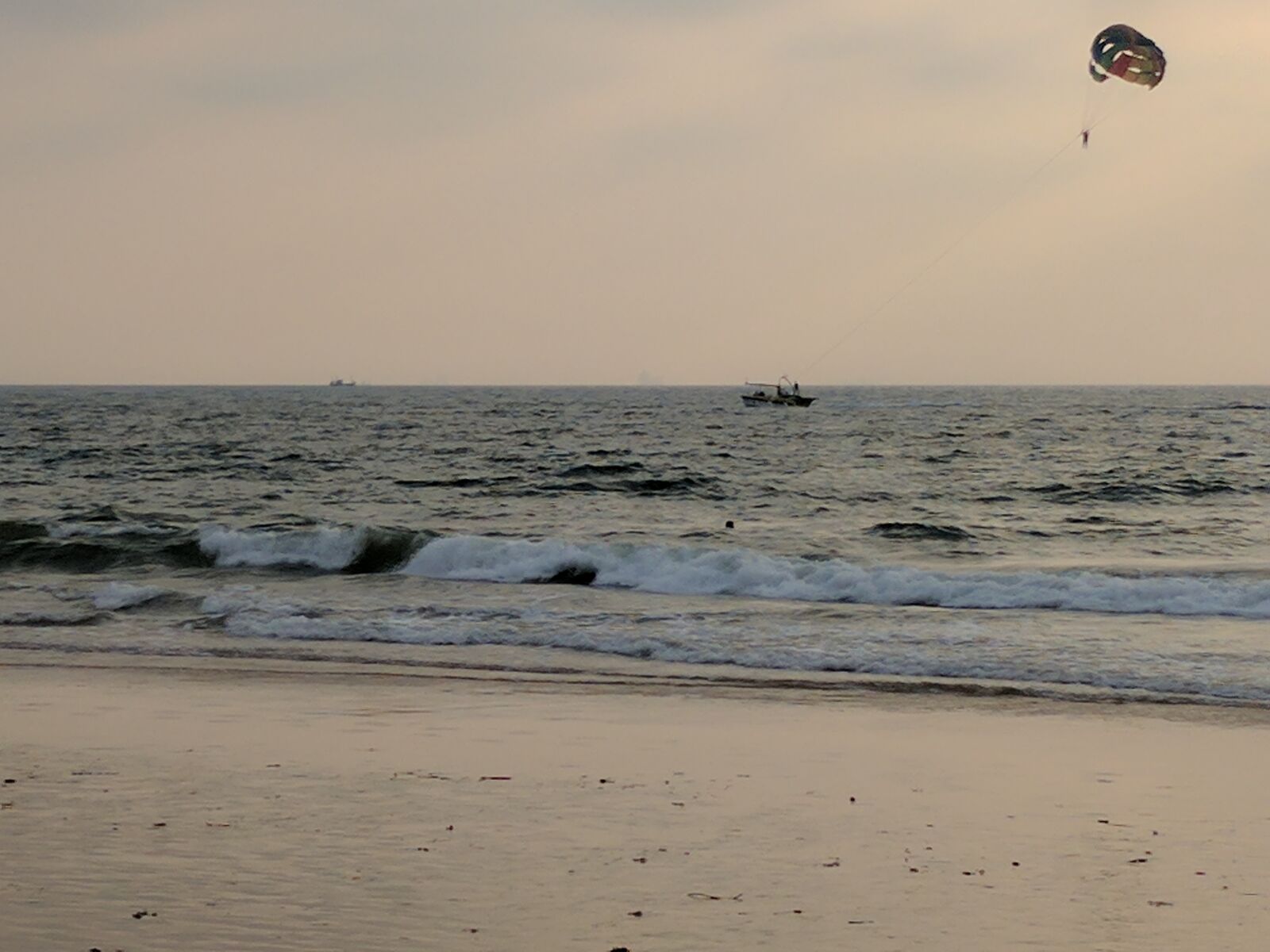 Google Pixel sample photo. Goa, paragliding, beach photography