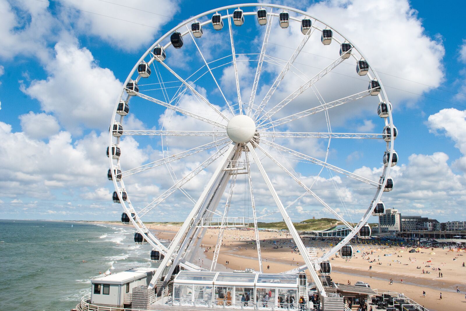 Nikon D3000 sample photo. Ferris wheel, scheveningen, beach photography