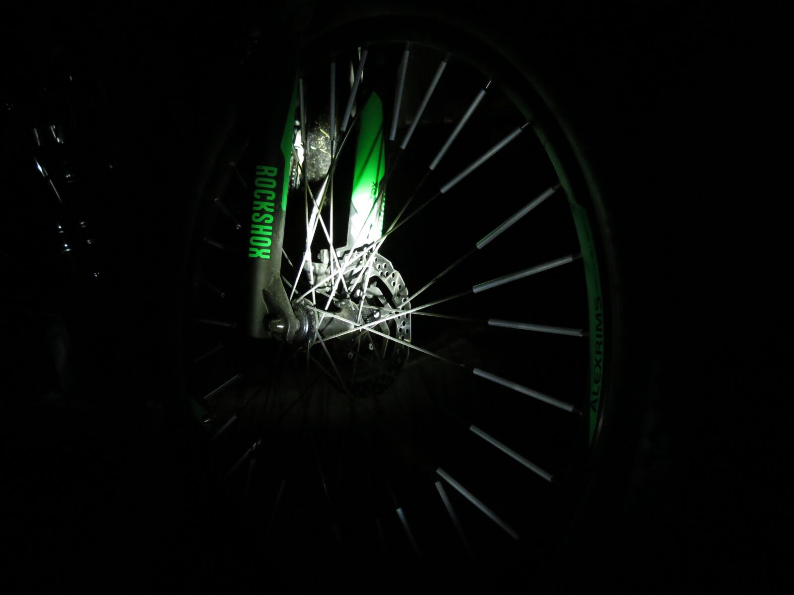 Canon PowerShot SX40 HS sample photo. Bike, spokes, dark photography