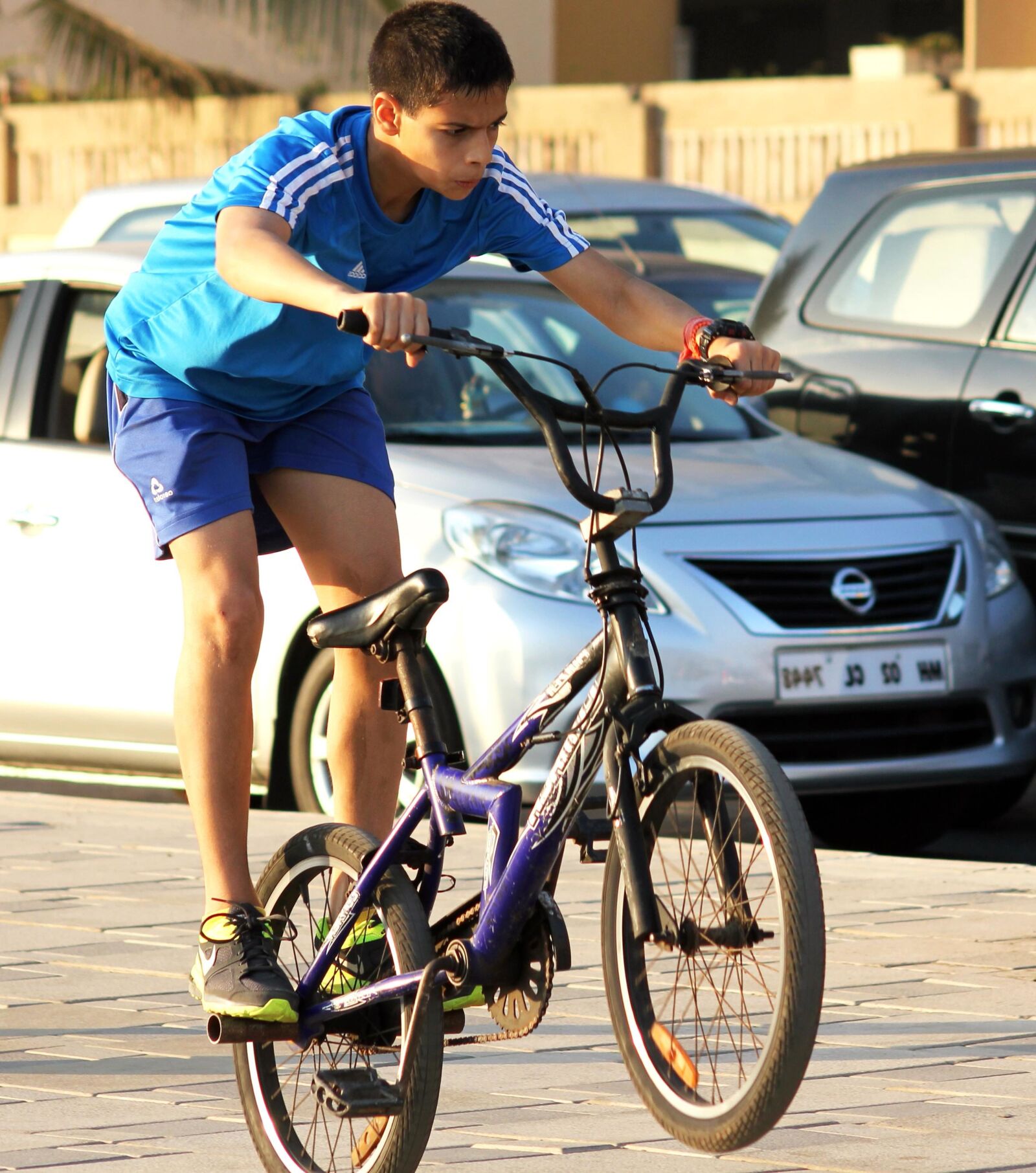 Canon EOS 550D (EOS Rebel T2i / EOS Kiss X4) sample photo. Child, bicycle, urban, town photography